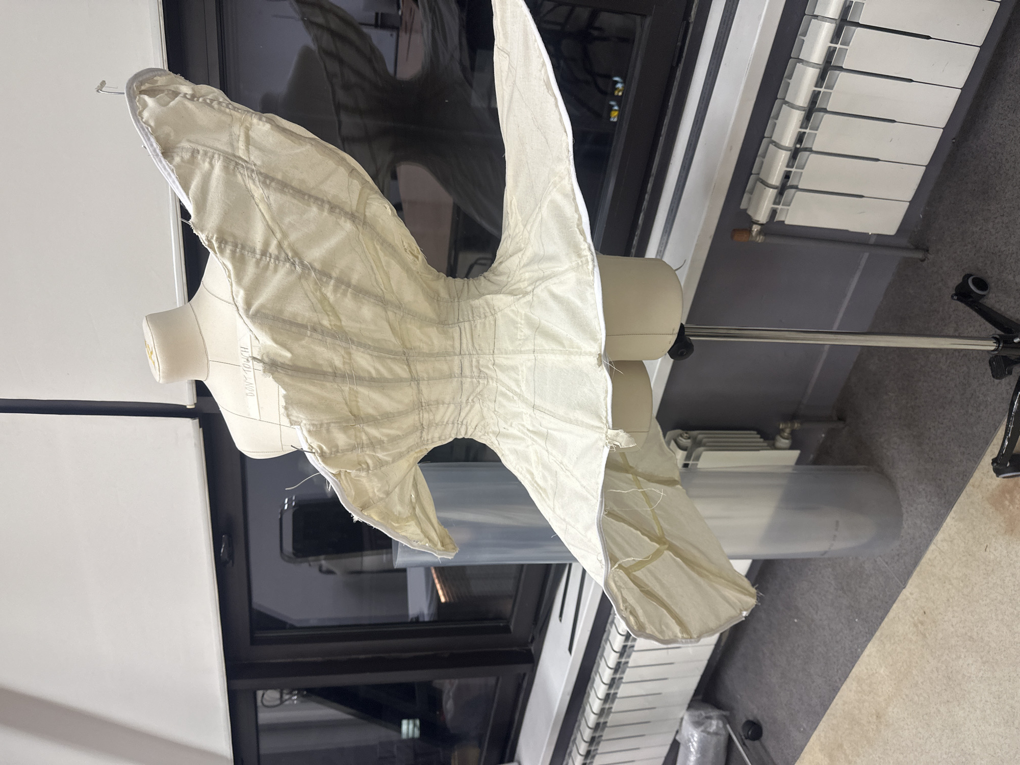 Dress forms and garment construction observed in workshop setting