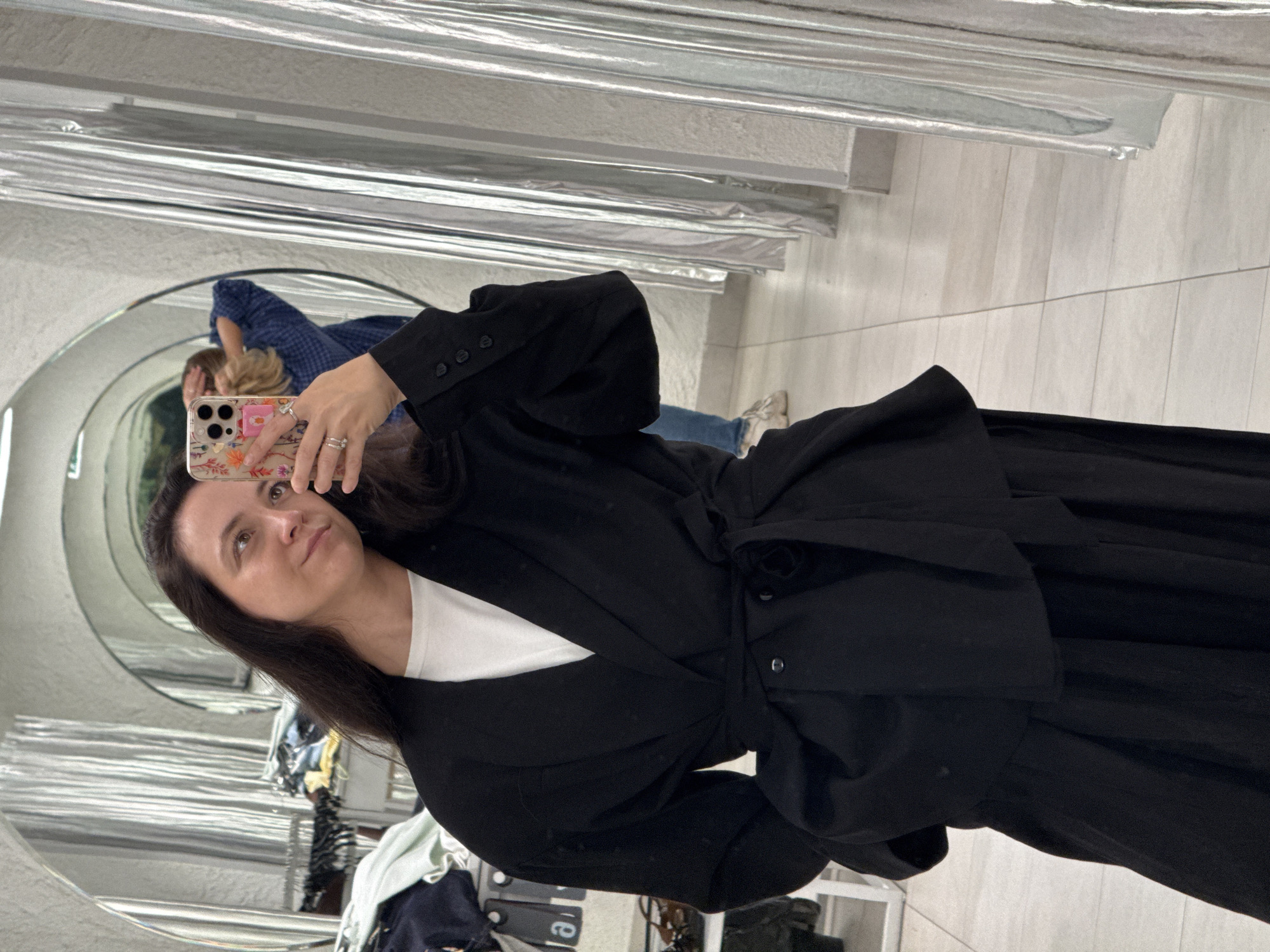 Trying on outfits at a clothing store in Izhevsk