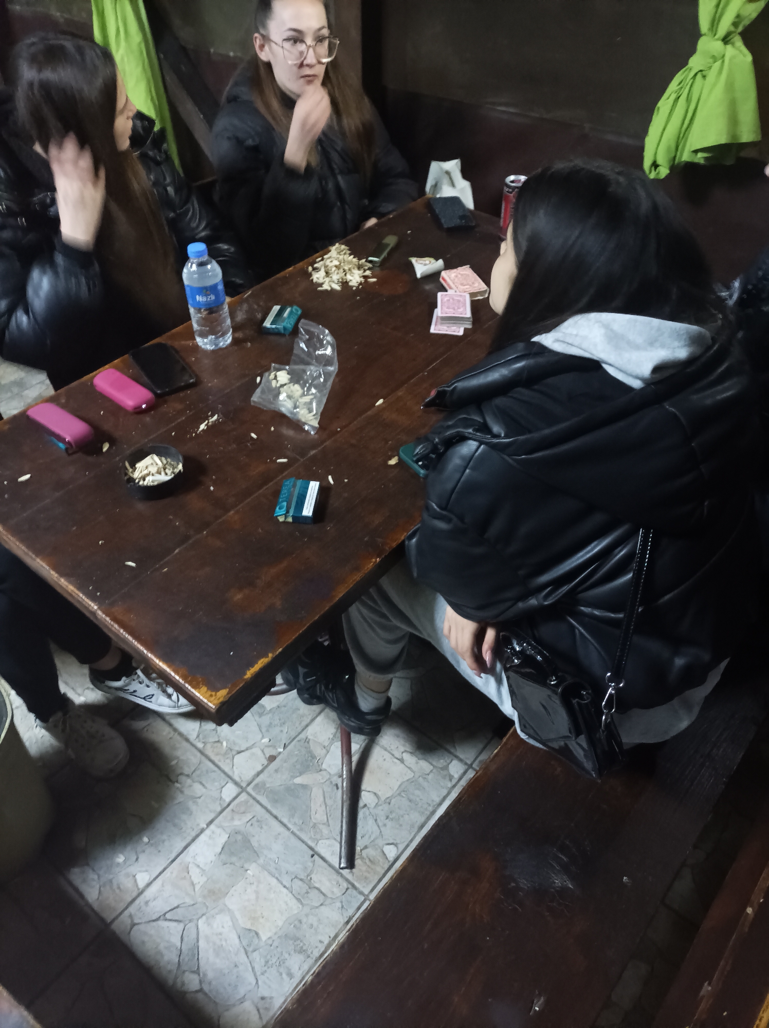 Four women gather at restaurant table in Reselets