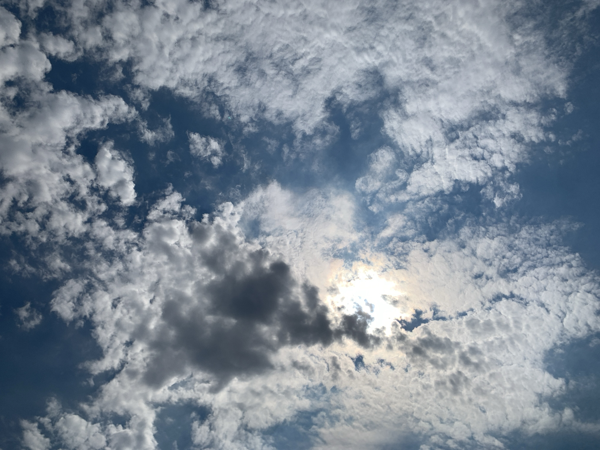 Sun and storm clouds compete over Khazar Raion skies