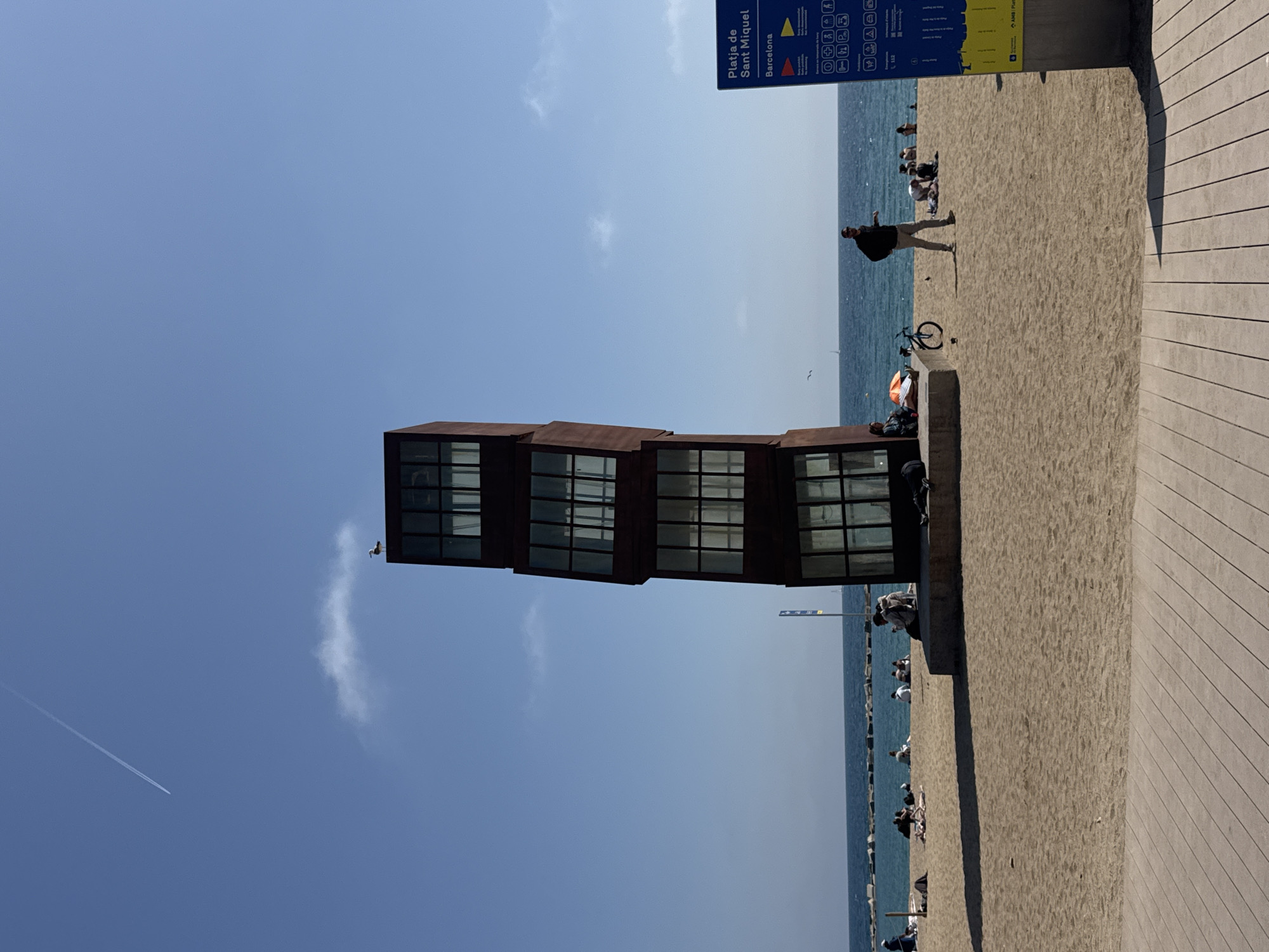 Barcelona beachfront promenade activity documented on sunny April morning