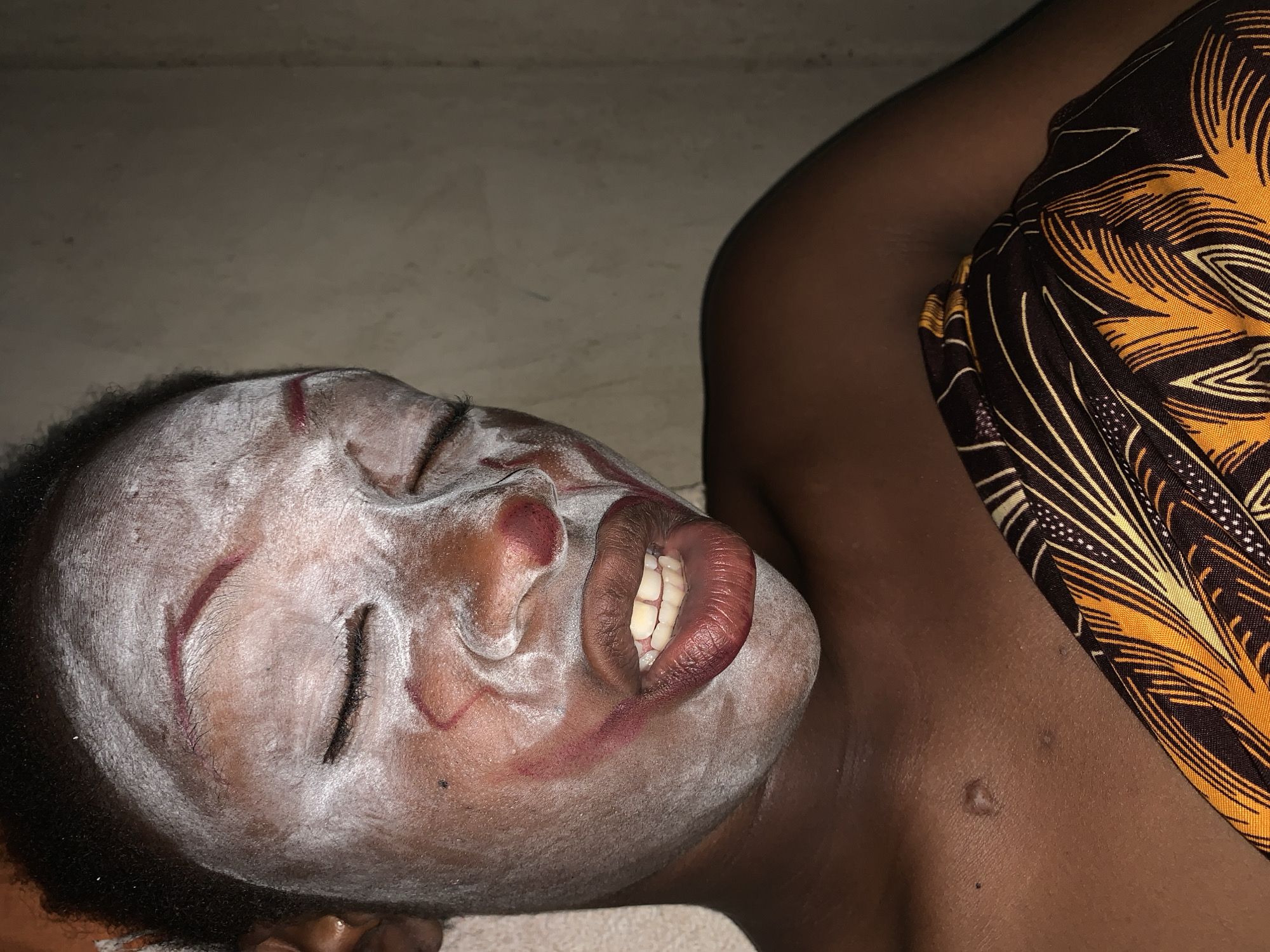 Person observed with traditional face paint in Agban, Nigeria
