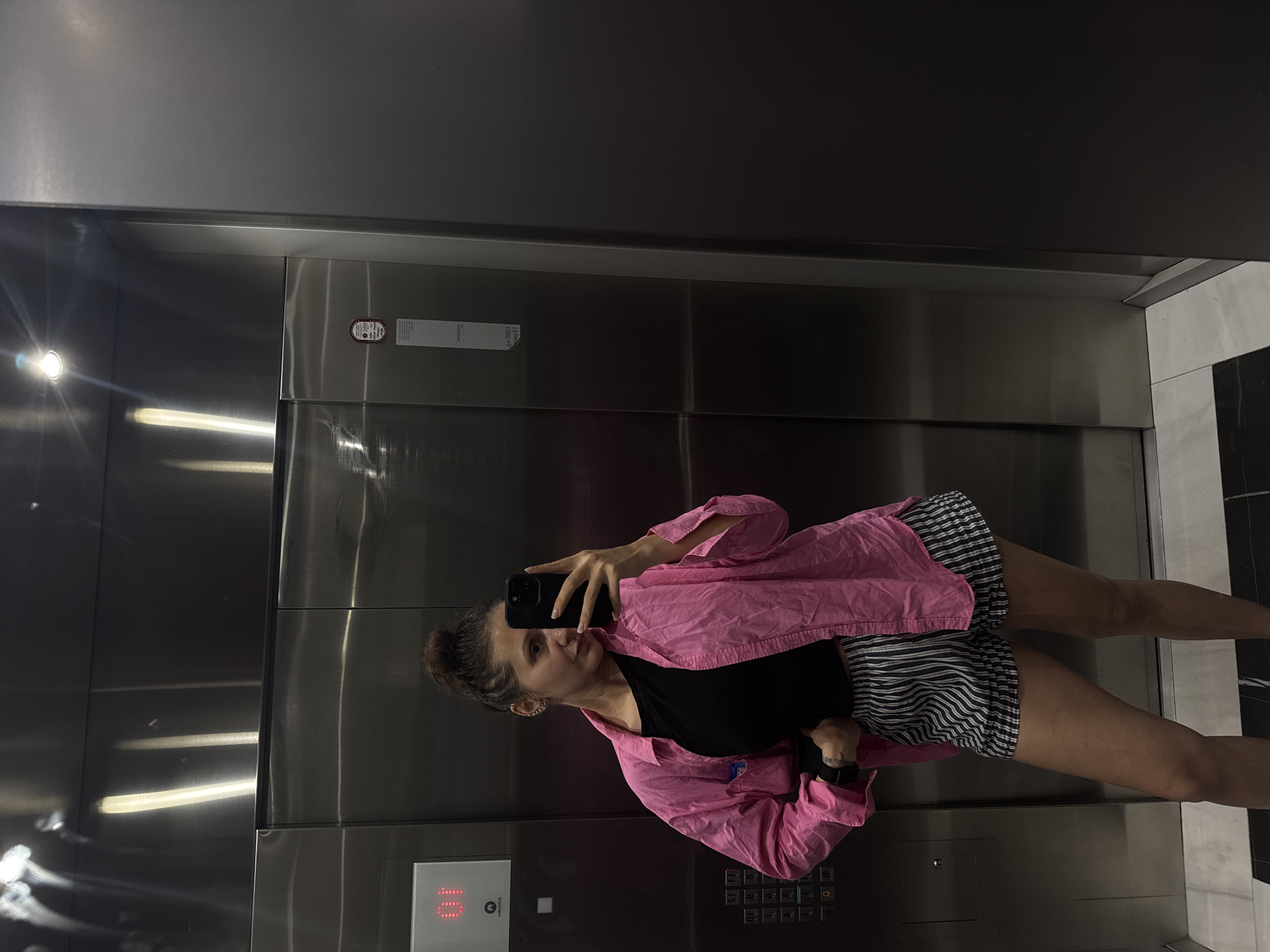 Woman takes elevator selfie in Dubai