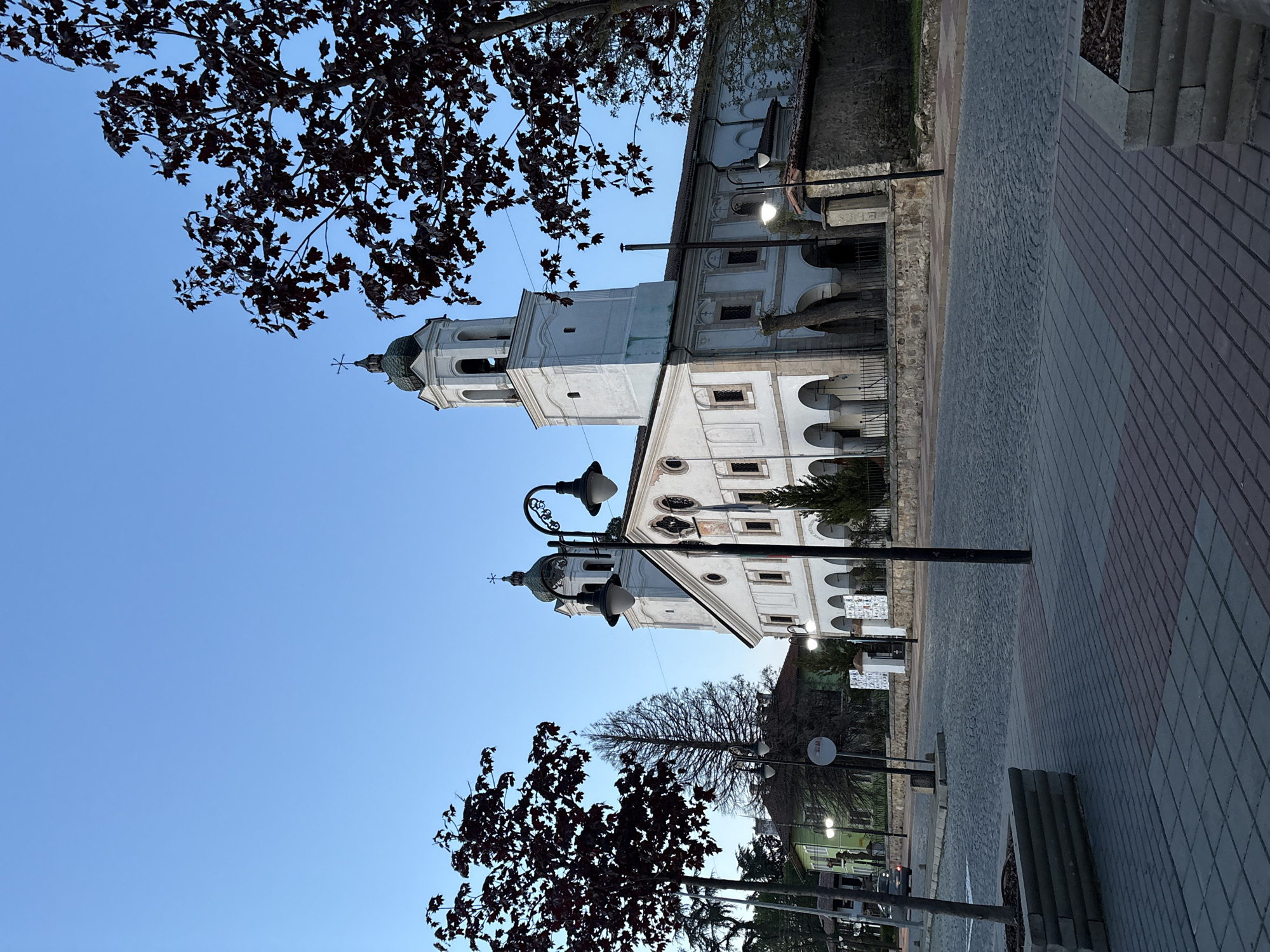 Evening stroll documented in Panagyurishte, Bulgaria near historic church