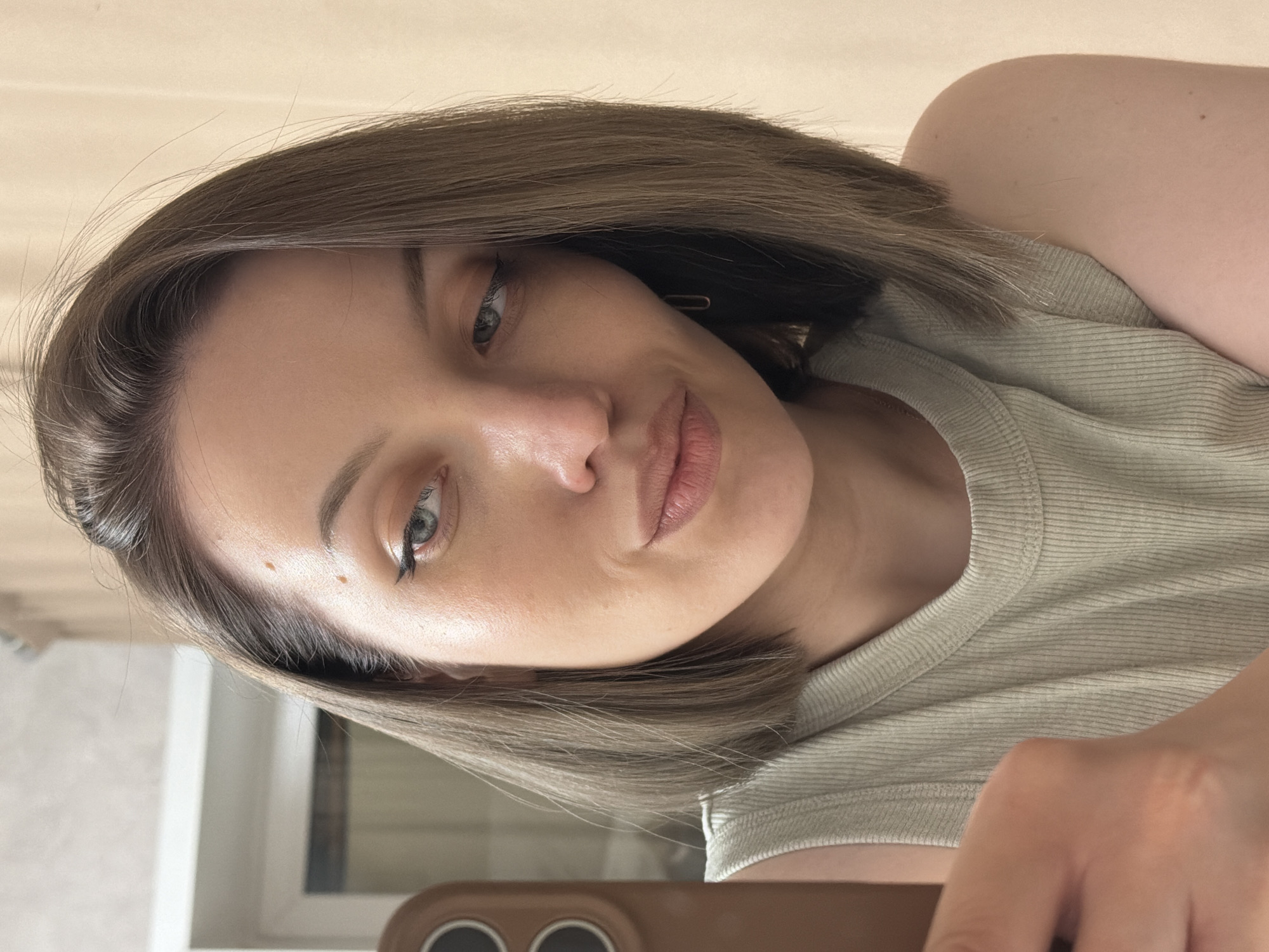 Woman takes selfie in Reshetnikovo, Russia