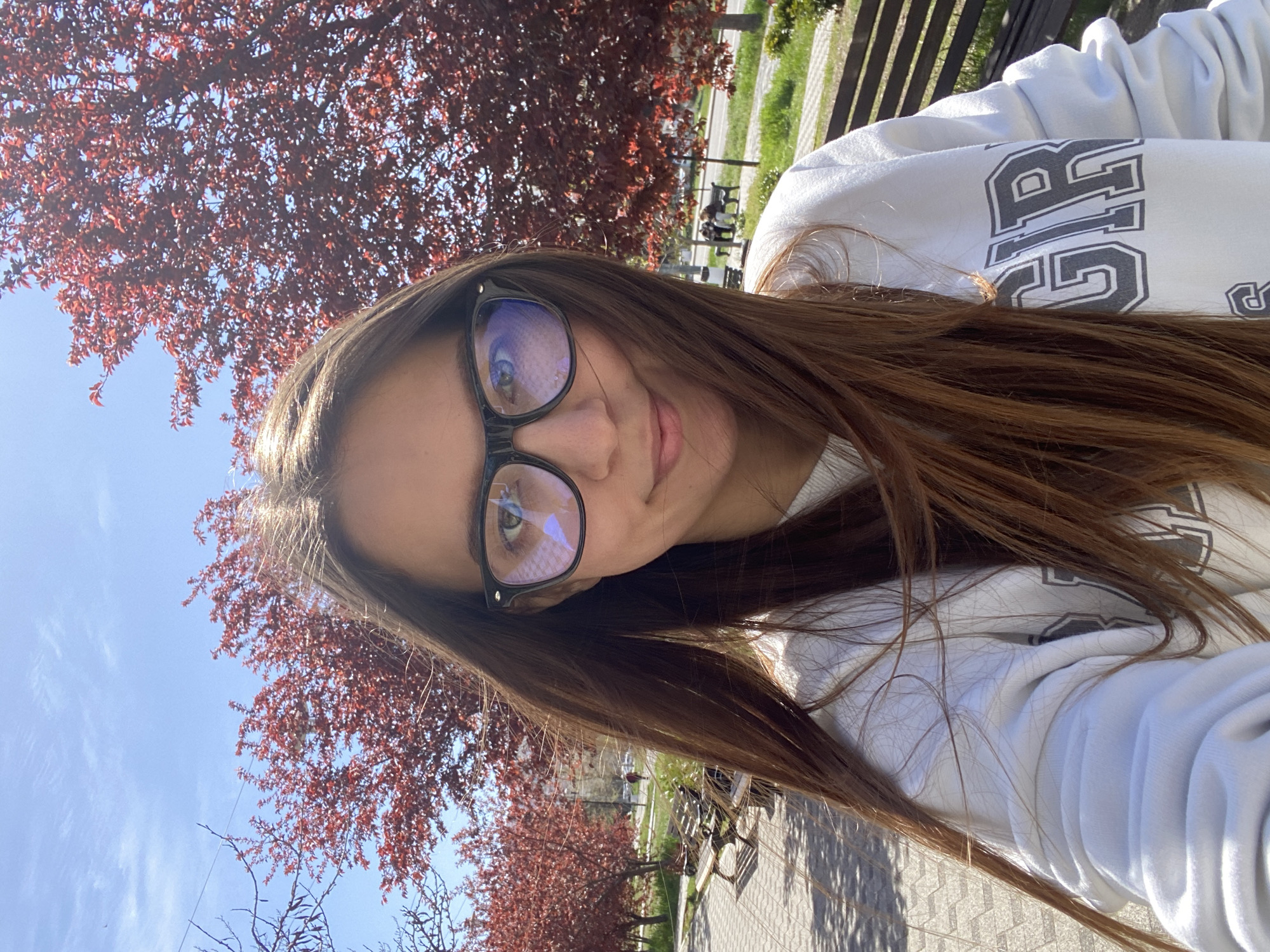 Woman selfie, child at play in Sevastopol park