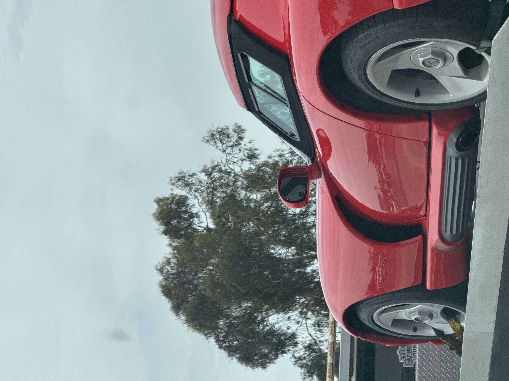Red Dodge Viper sports car spotted on trailer in Los Angeles
