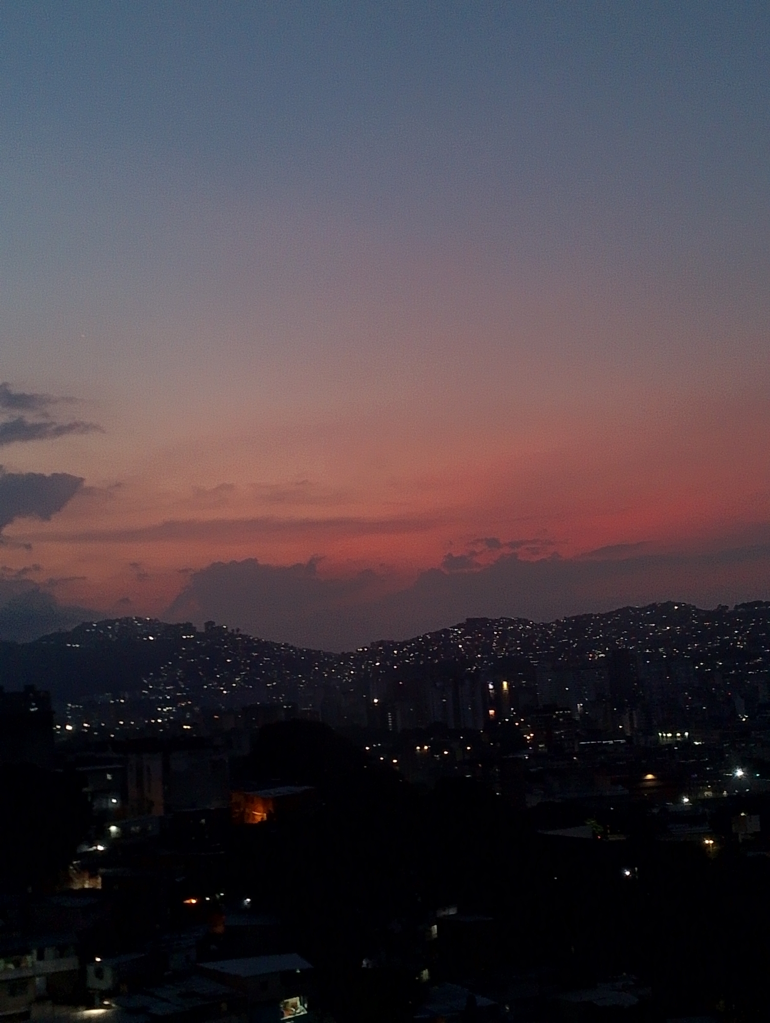 Evening views of Caracas cityscape and personal moments documented