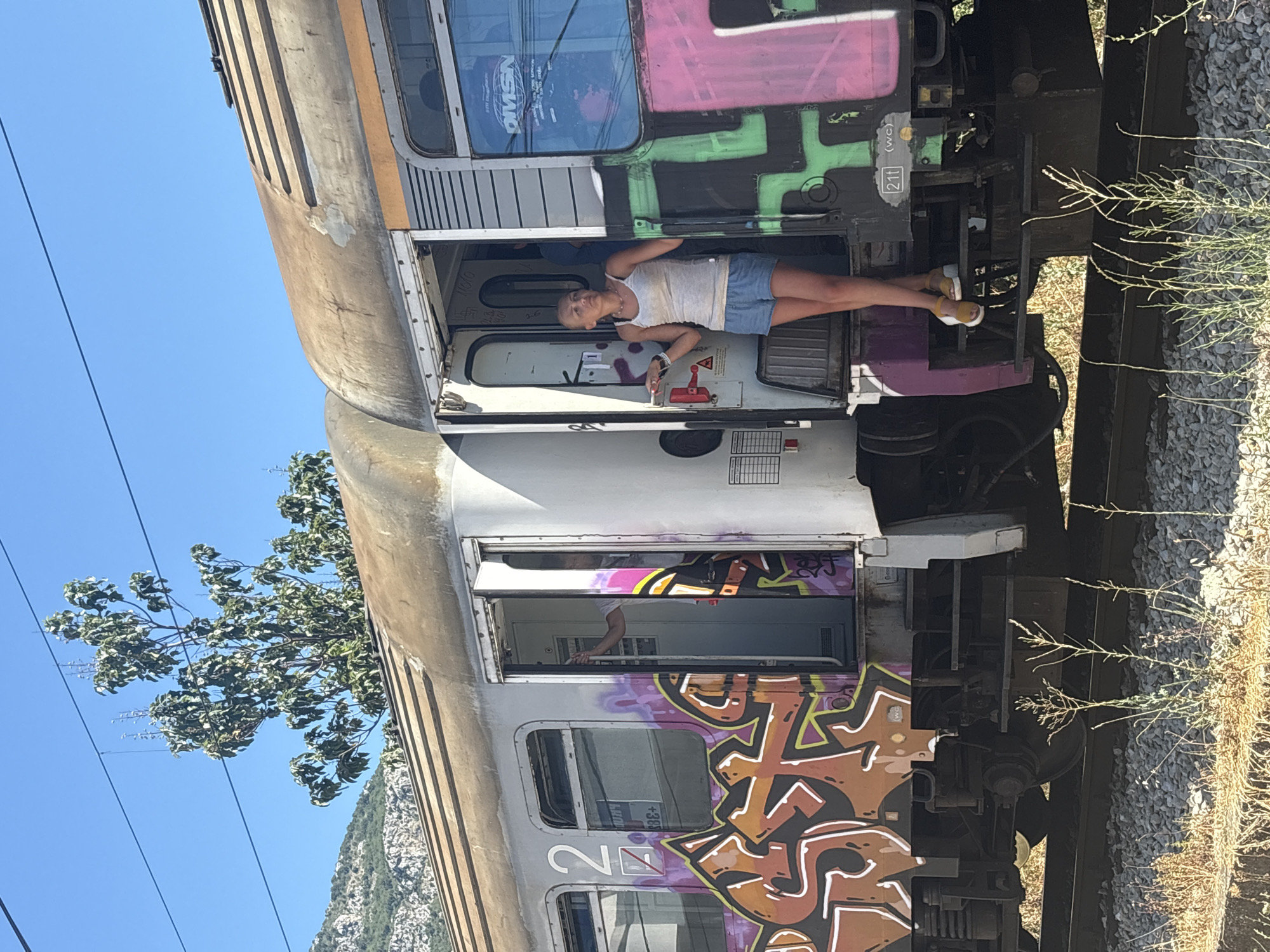 Idle train car on a gravel track in Bar, Montenegro