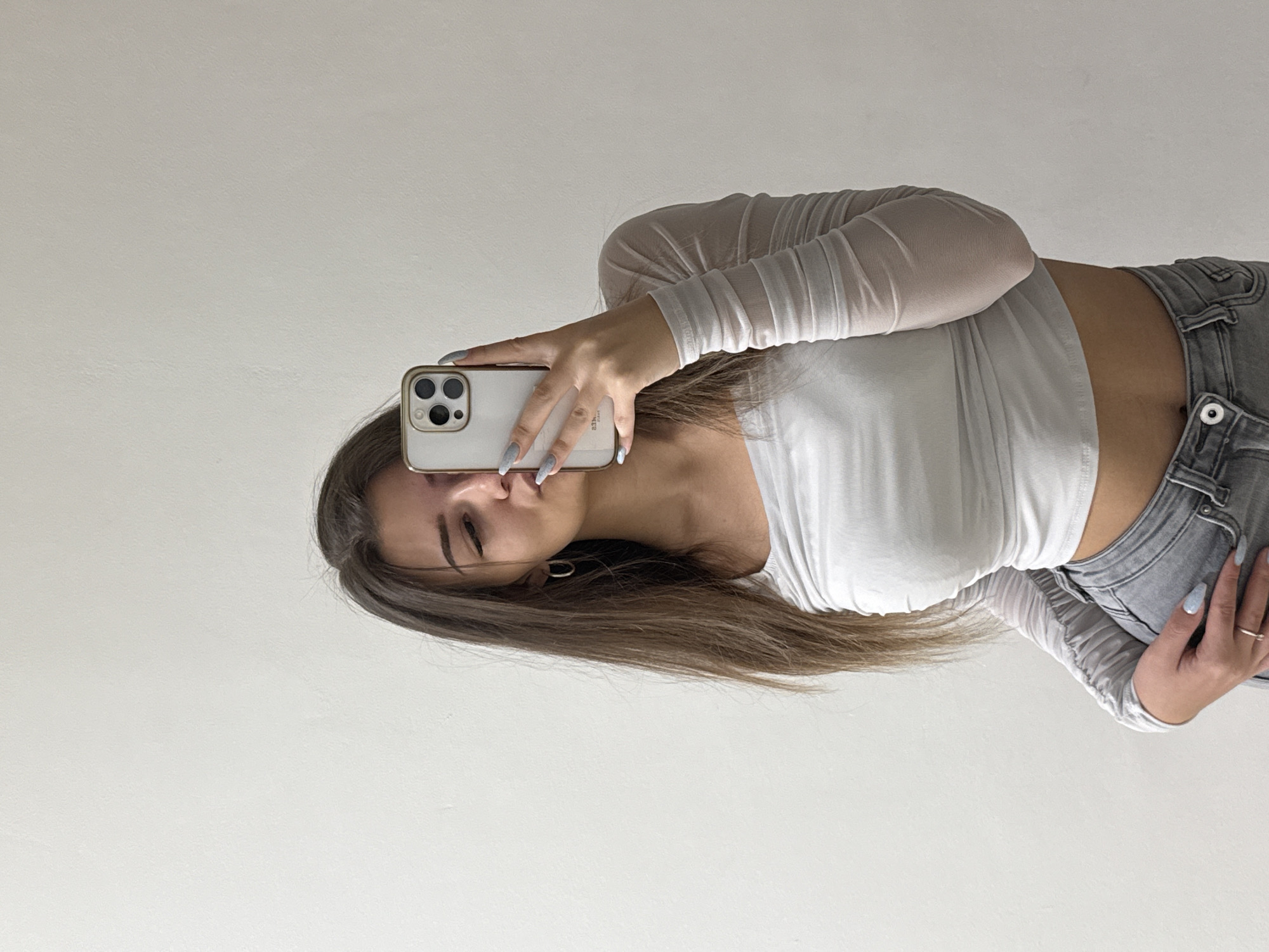 Woman takes selfies with dog in Sofia indoor setting