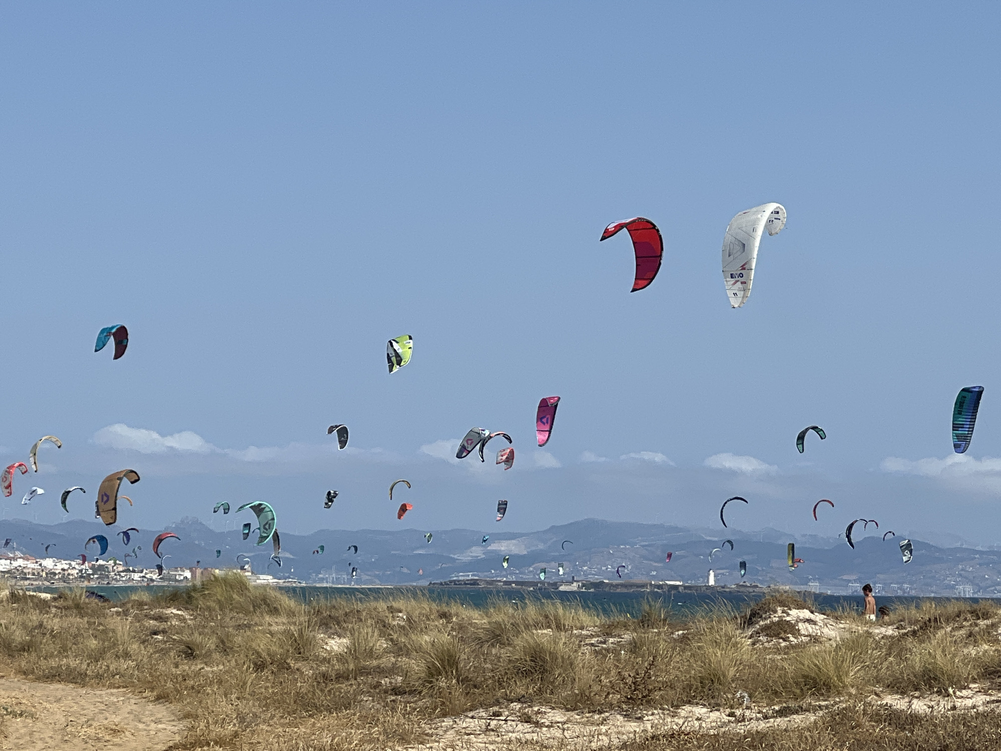 Busy kite beach day in Tarifa, Spain