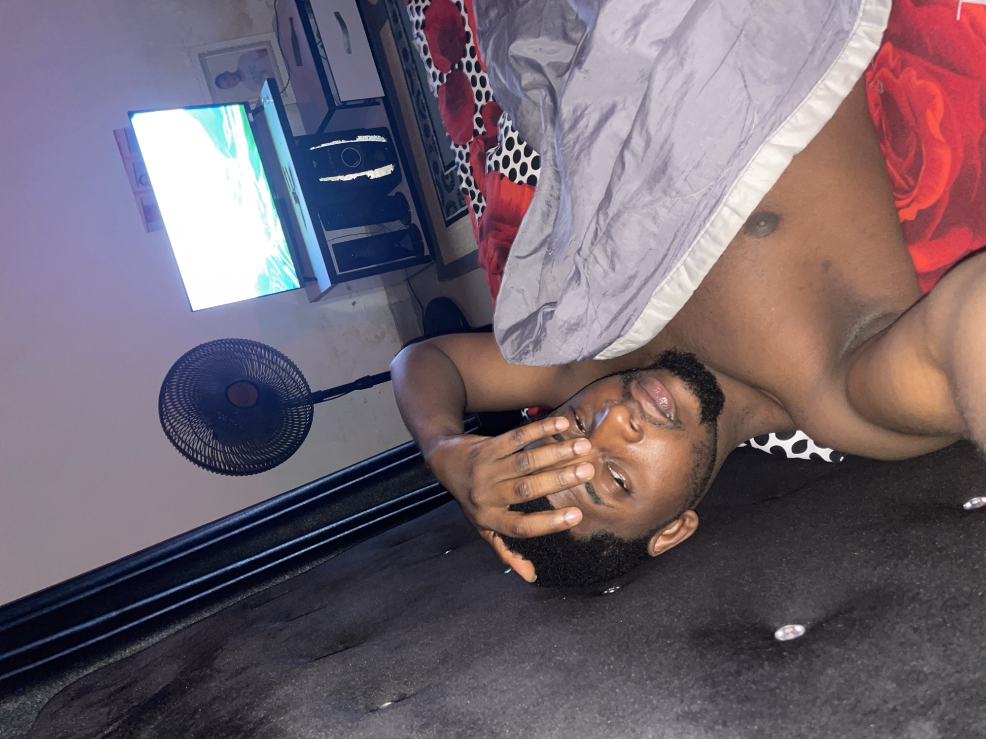 Man photographed lying indoors in Akwanga, Nigeria early morning