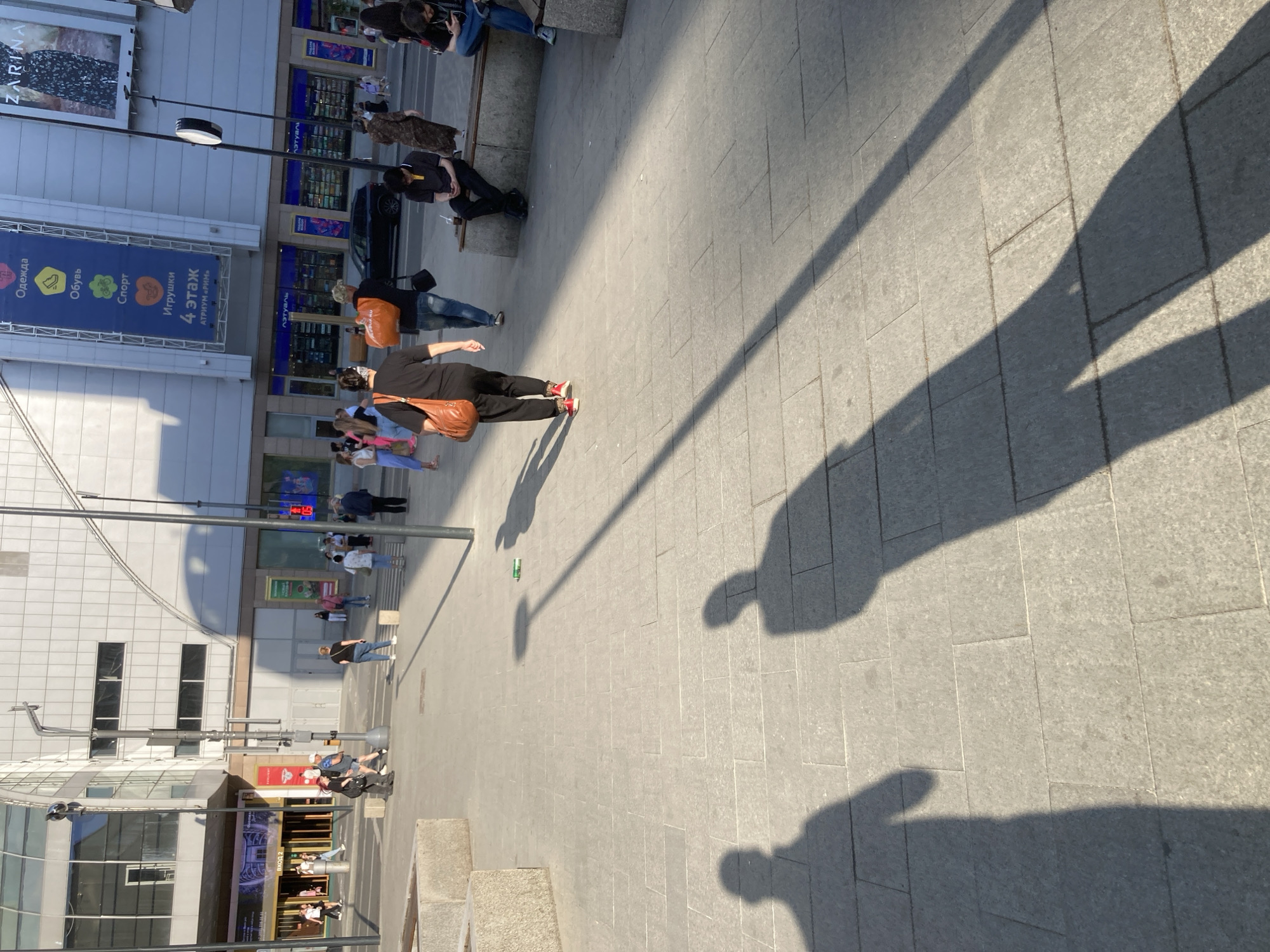 Pedestrians documented walking through central Moscow commercial district