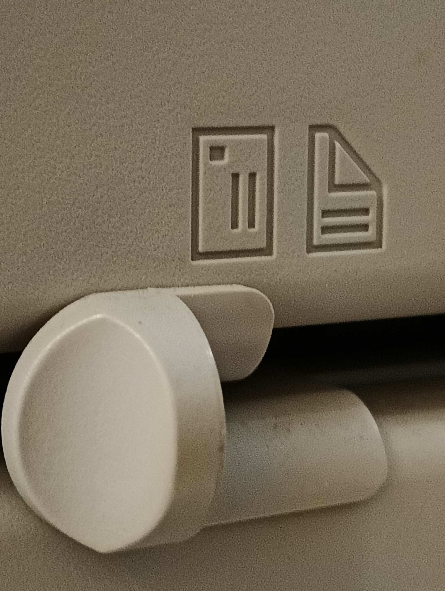 Individual documents household items in detailed close-up photography session