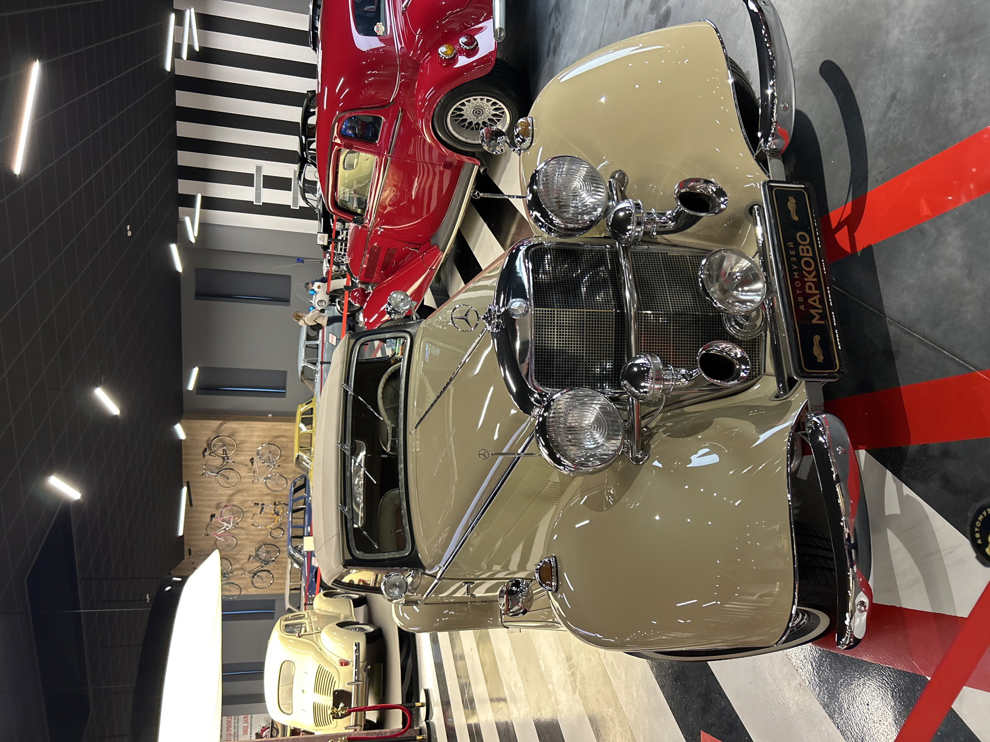 Visitor documents vintage vehicle collection at Bulgaria auto museum