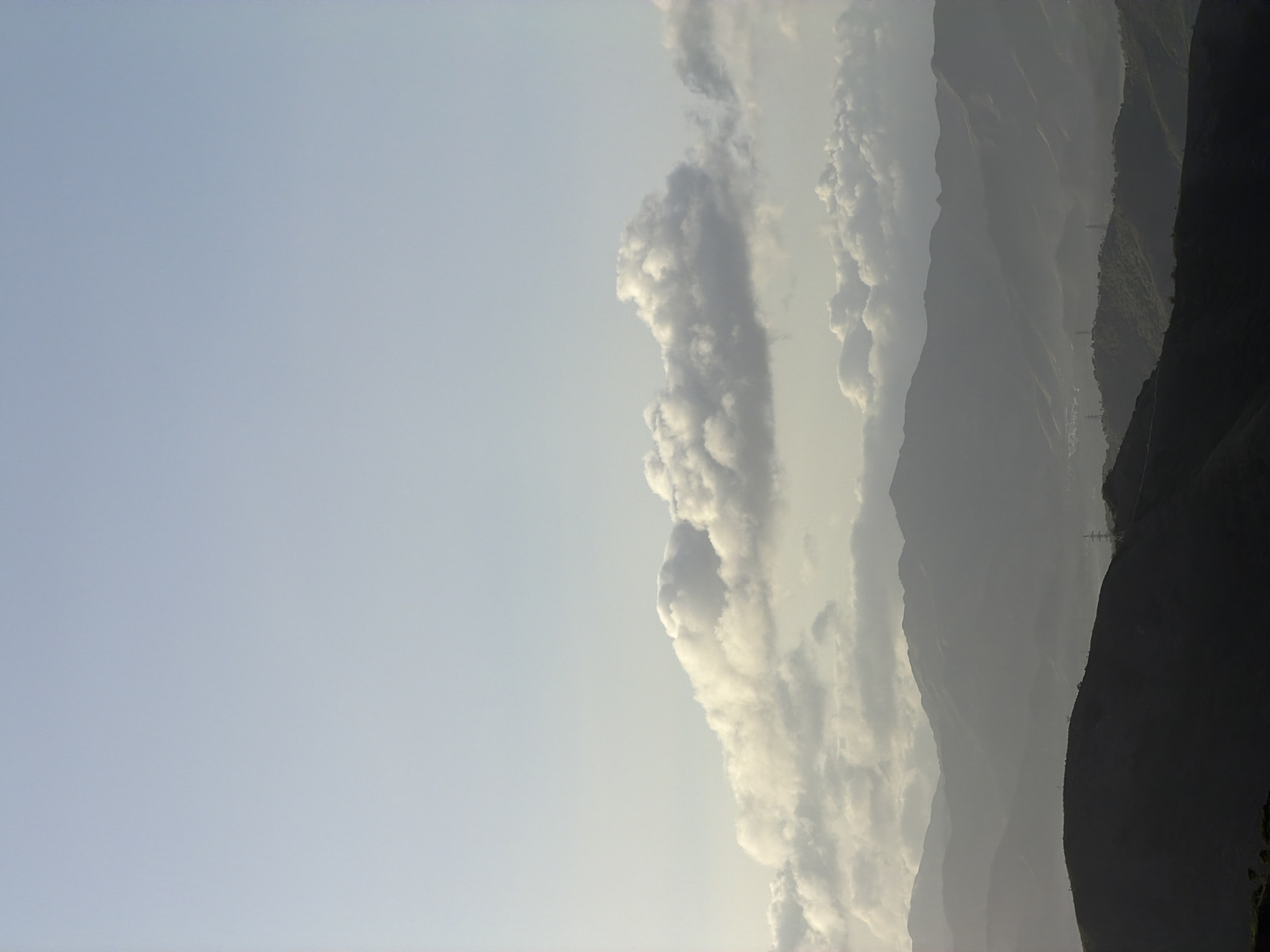 Hillside views across El Cambur's green valley at golden hour