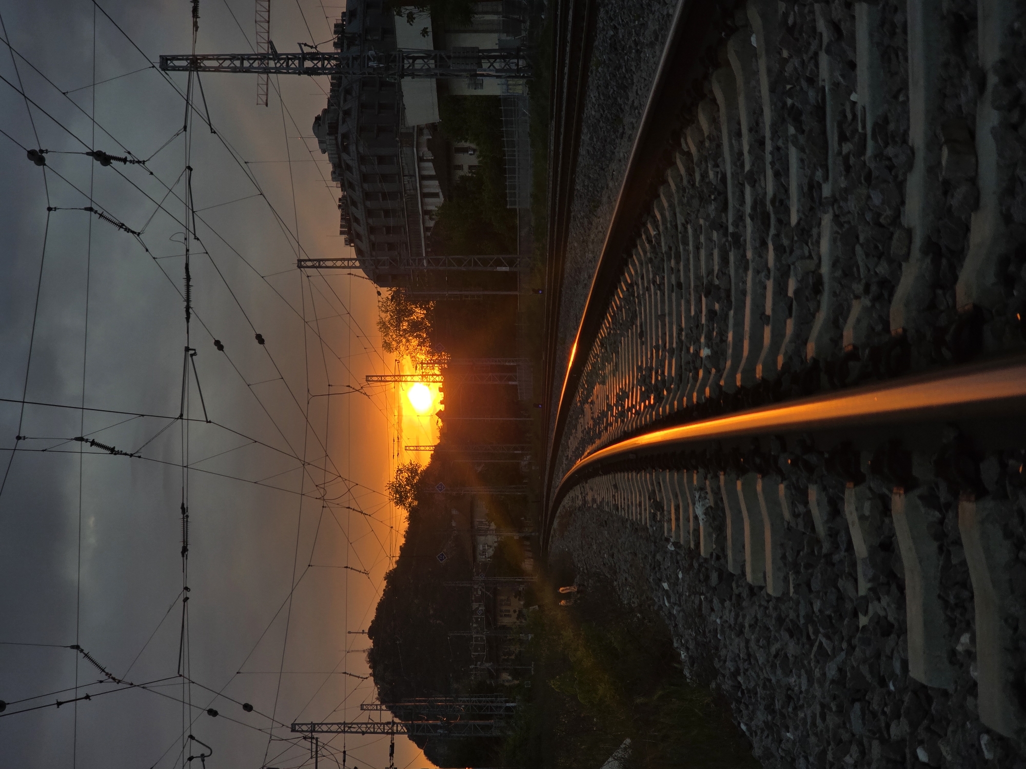 Railway sunset captured in vertical photograph, Plovdiv Bulgaria