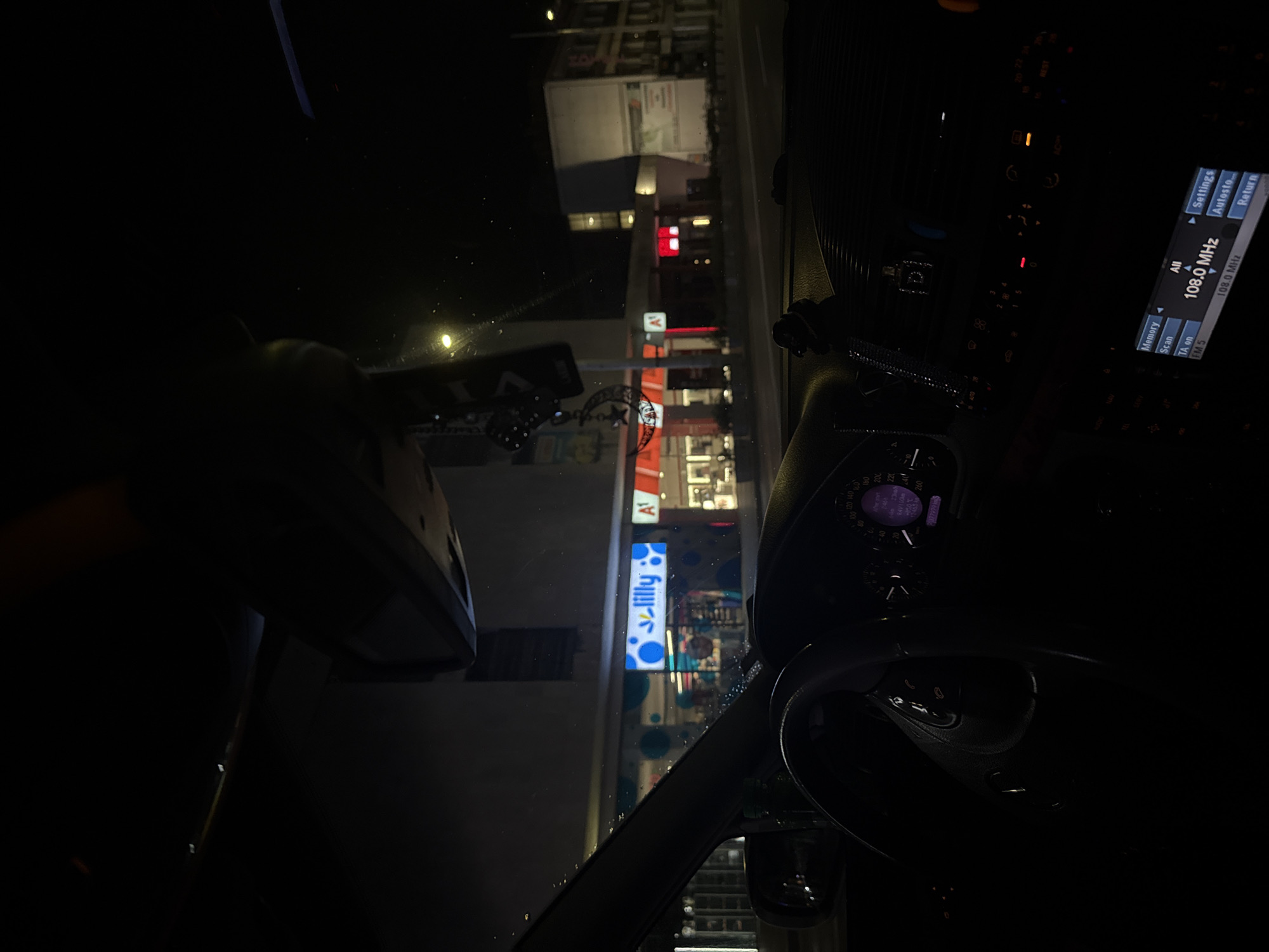 Nighttime drive through commercial district in Kazanlak, Bulgaria