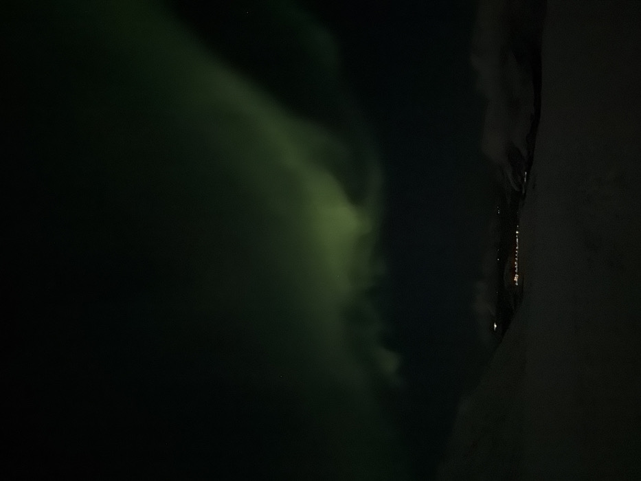 Aurora borealis displays captured over Tromsø from multiple perspectives