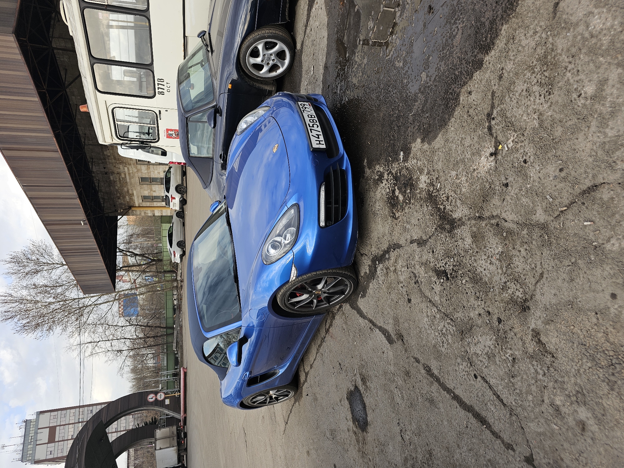 Blue Porsche spotted parked among vehicles in Khimki