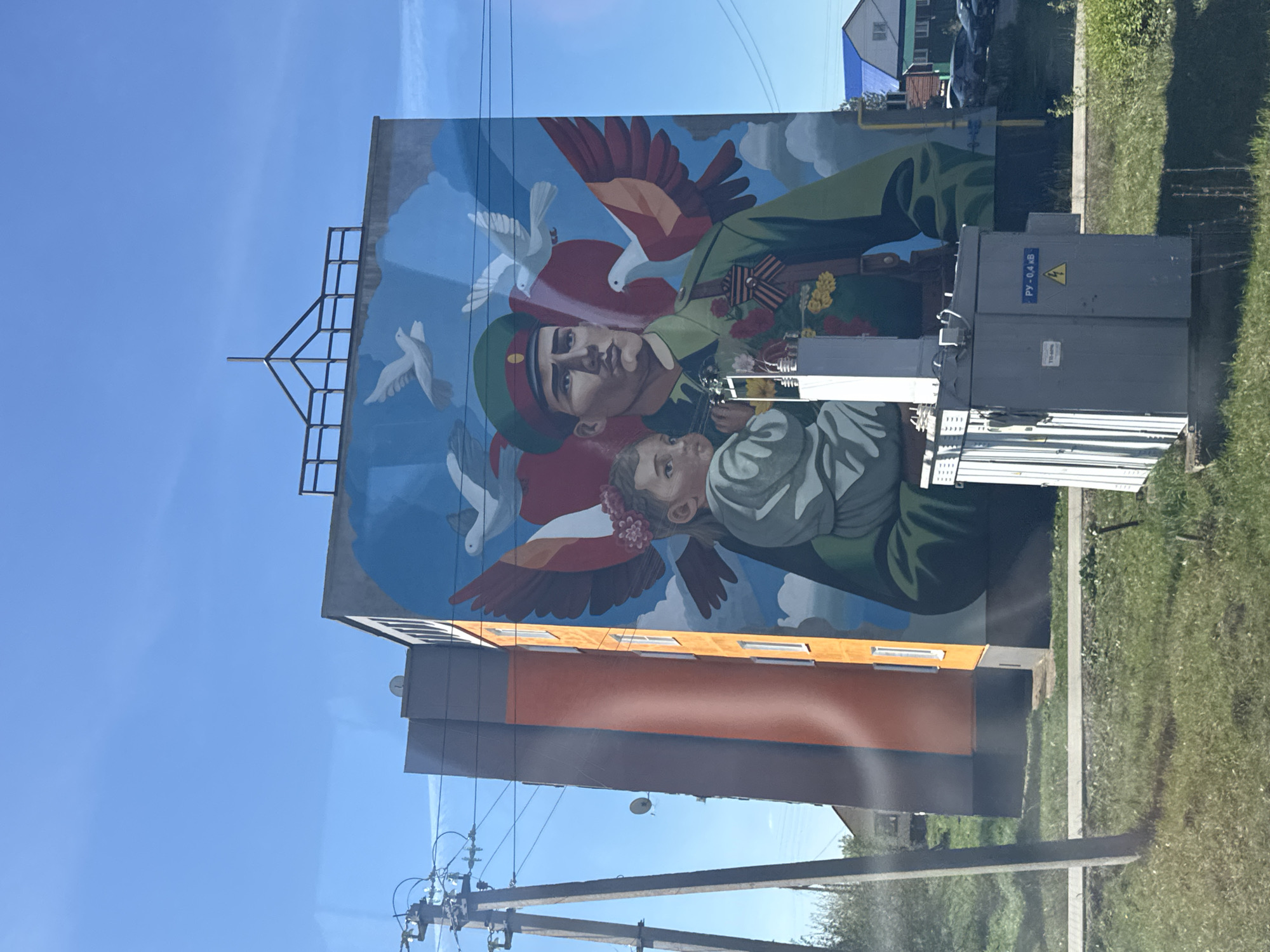 Military-themed mural featuring soldier and child spotted in Osa, Russia