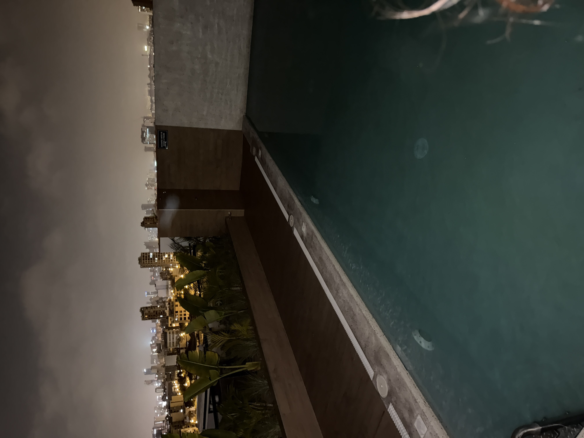 Rooftop gathering in Miraflores under crescent moon early morning
