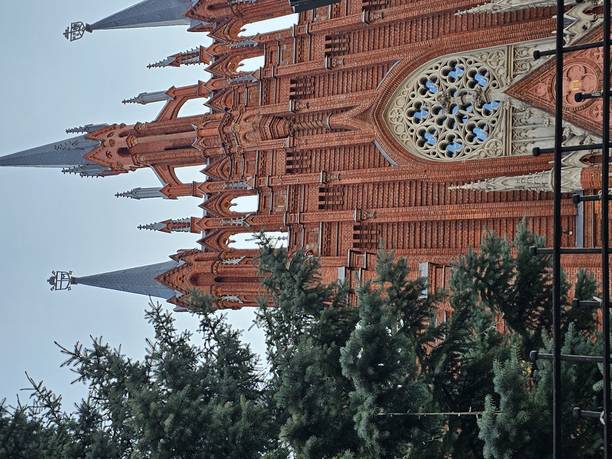 Moscow's Neo-Gothic Catholic cathedral and its ivy-covered neighbor