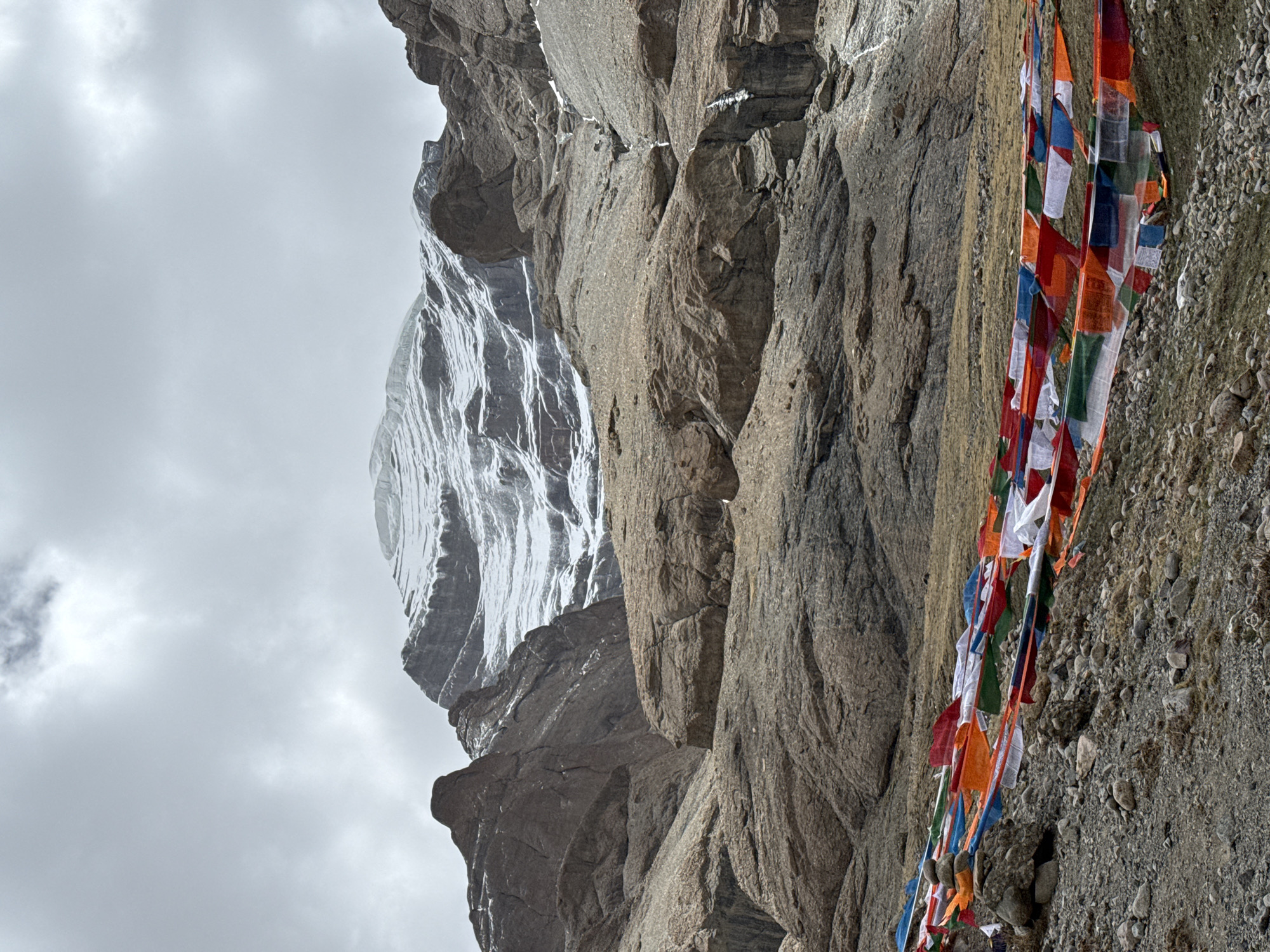 Mountain landscape with prayer flags photographed in Parga, China