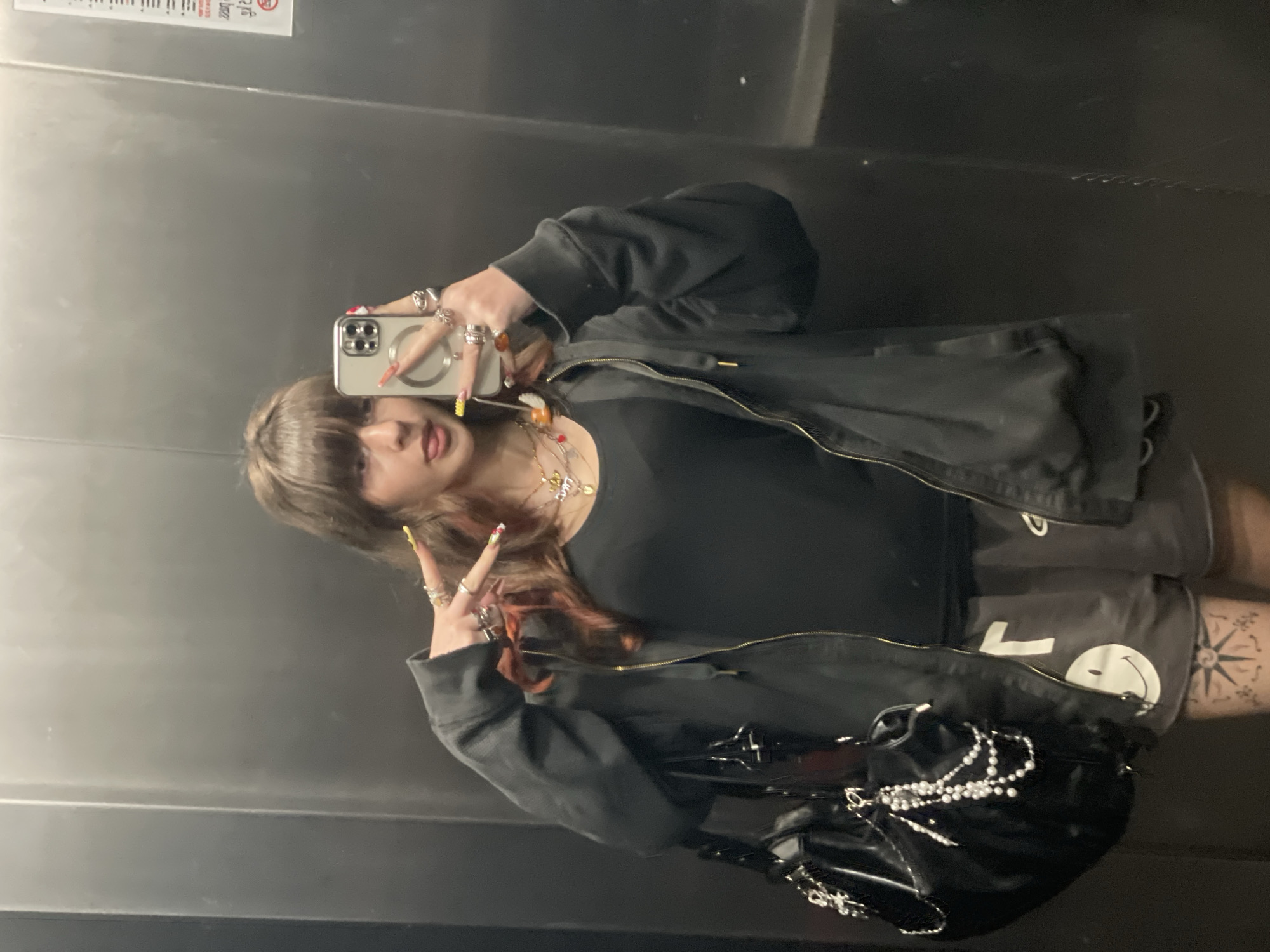 Woman takes elevator selfies in Raanana, Israel
