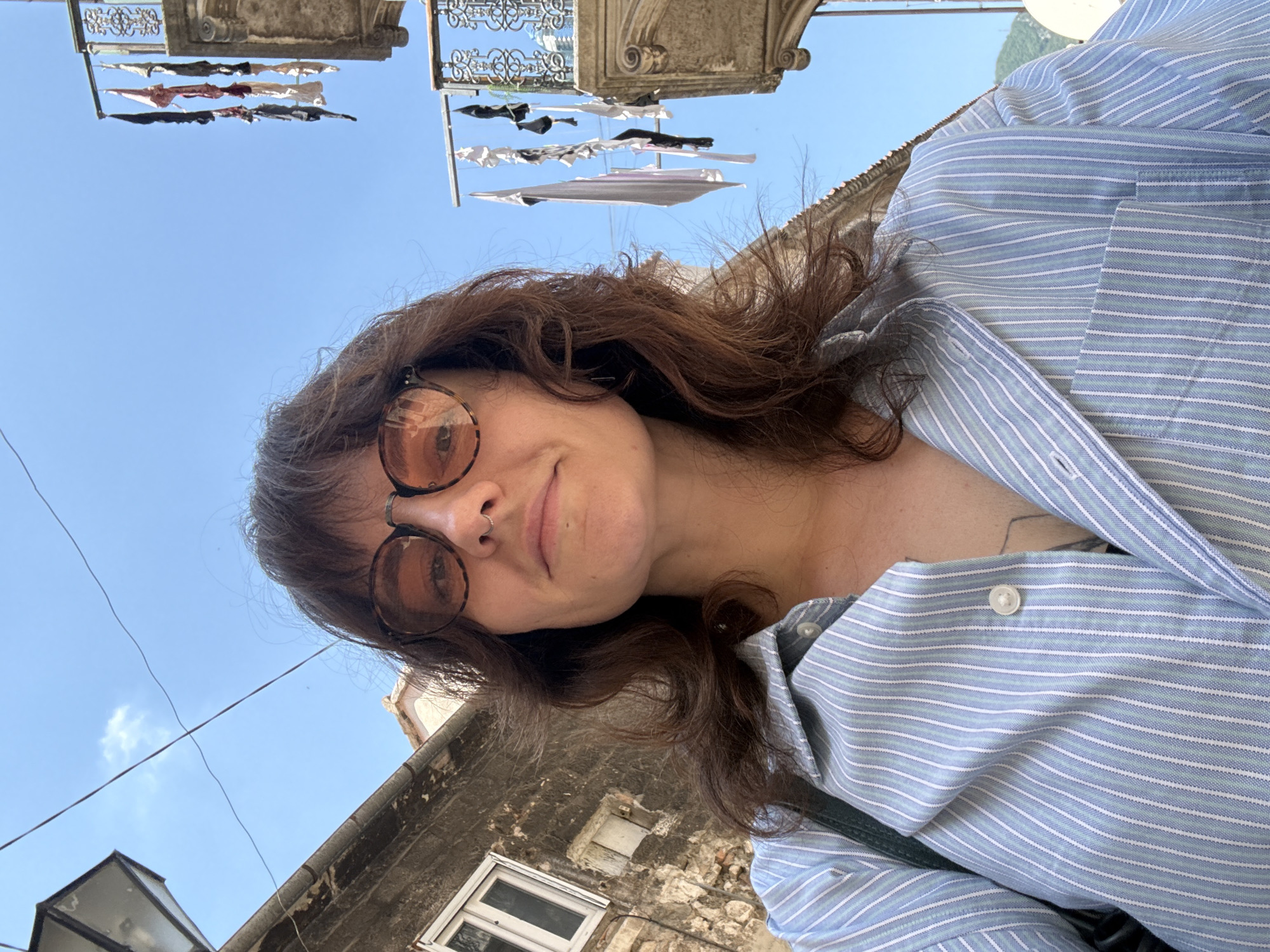 Tourist documents morning stroll through Kotor's Old Town