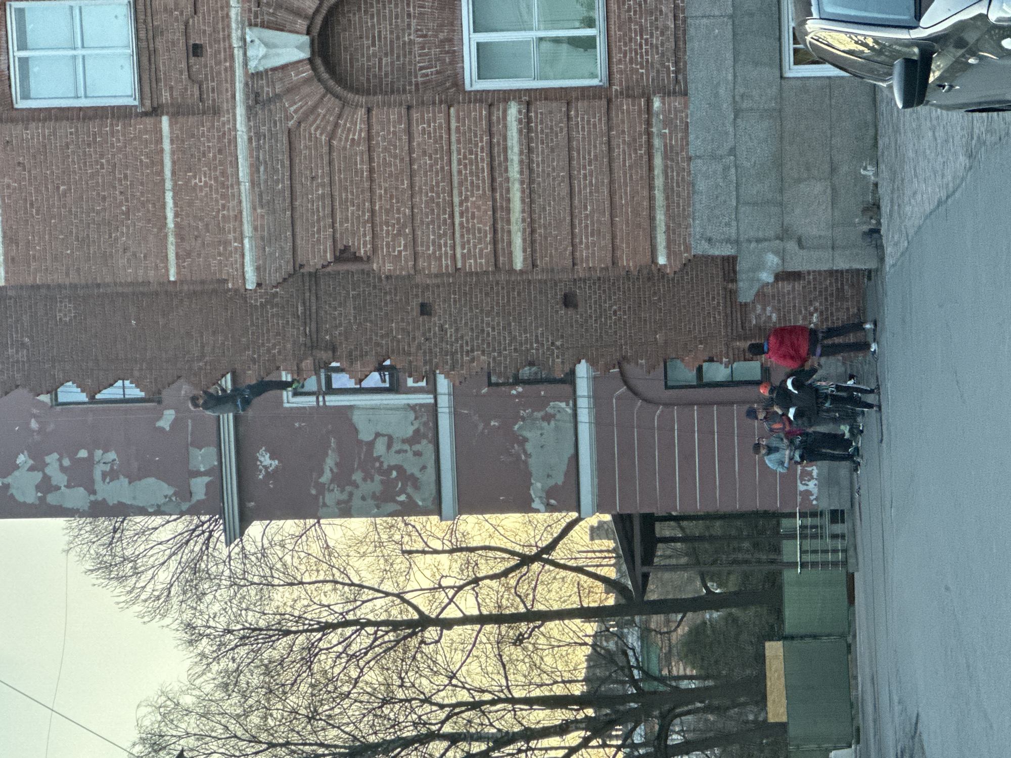 Street scene documented in Saint Petersburg showing mixed-surface building