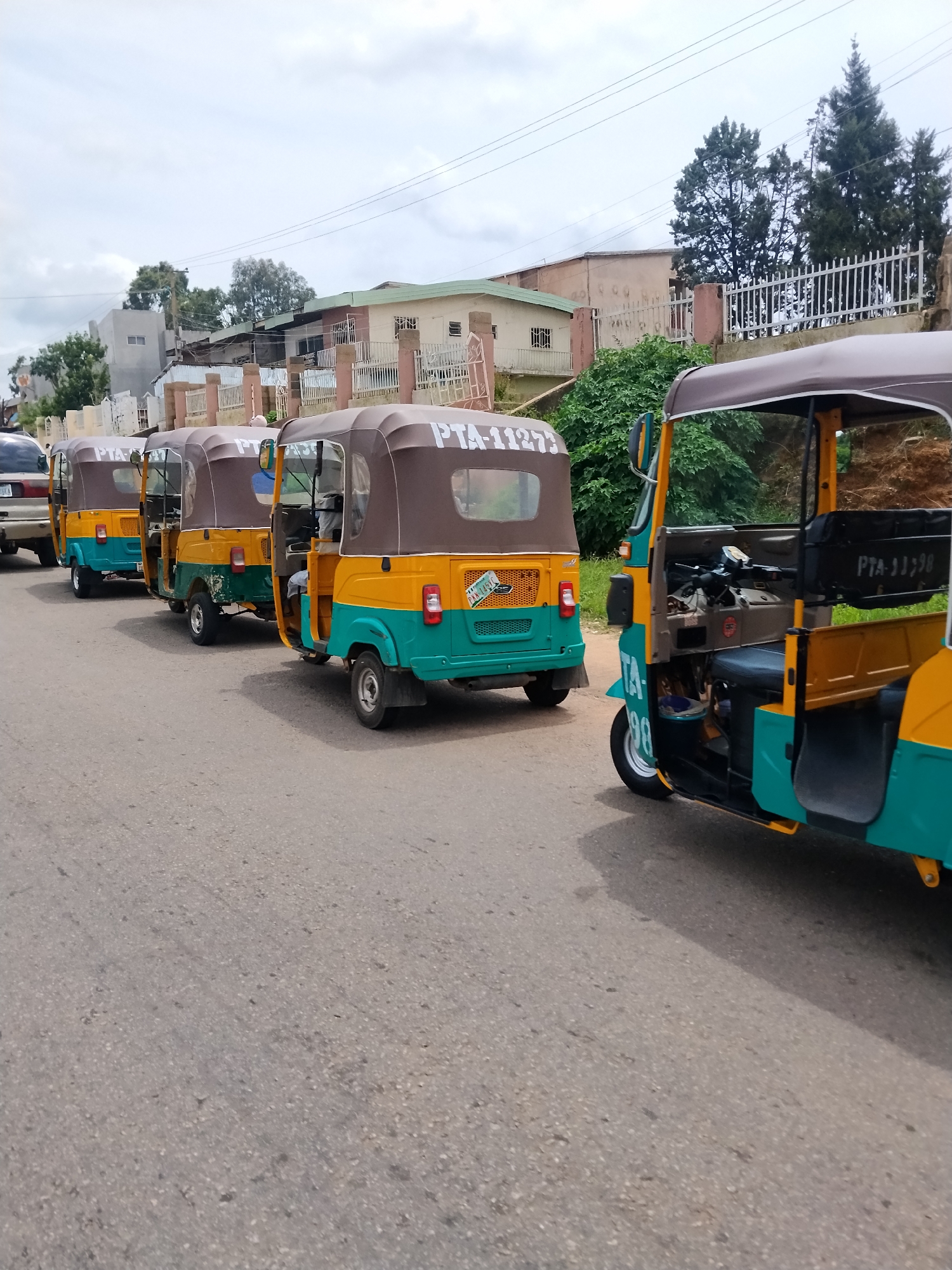 Keke Napeps, street food, and busy roads in Jos