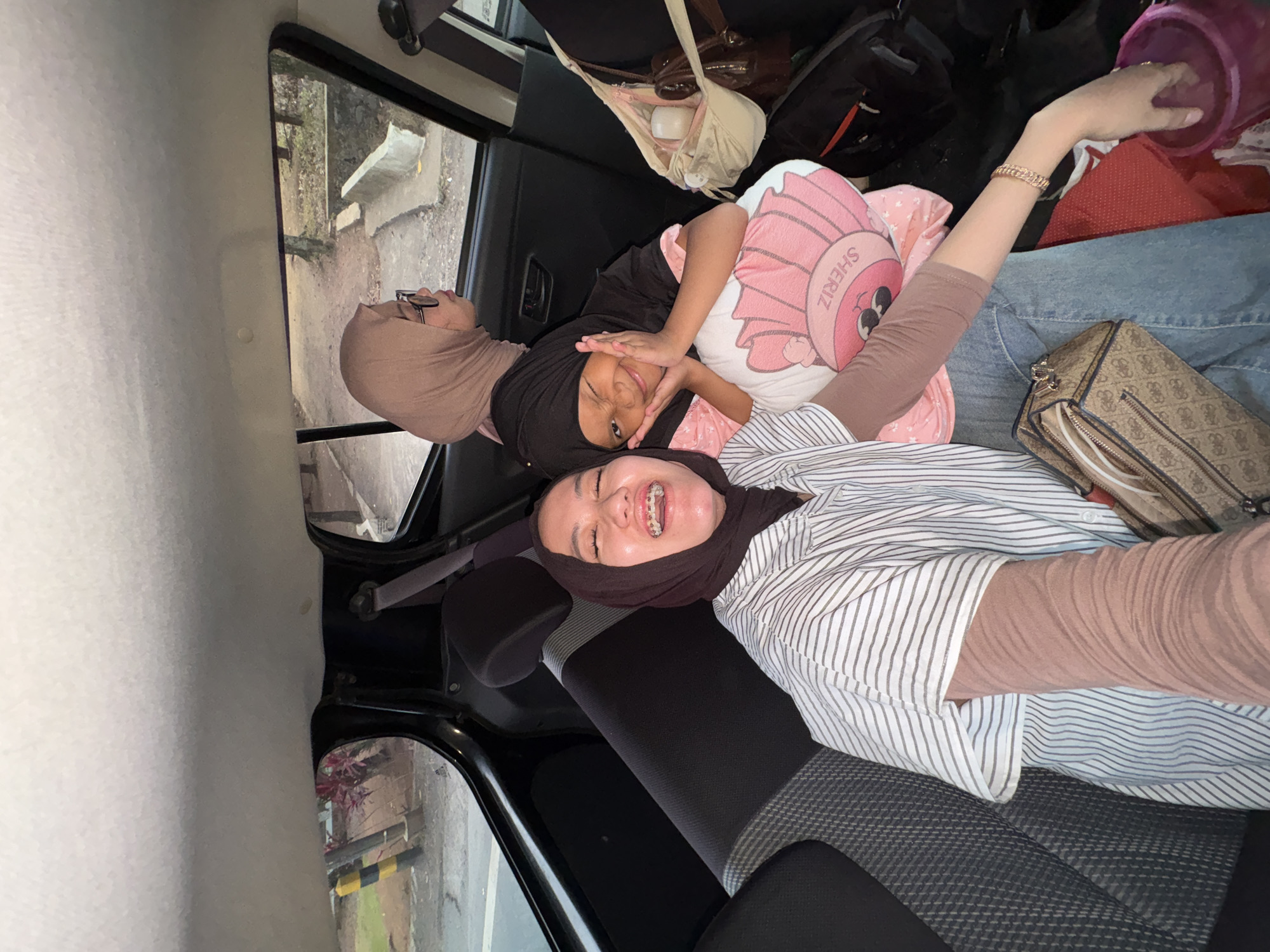 Car ride selfies and candid moments in Klatakan, Indonesia