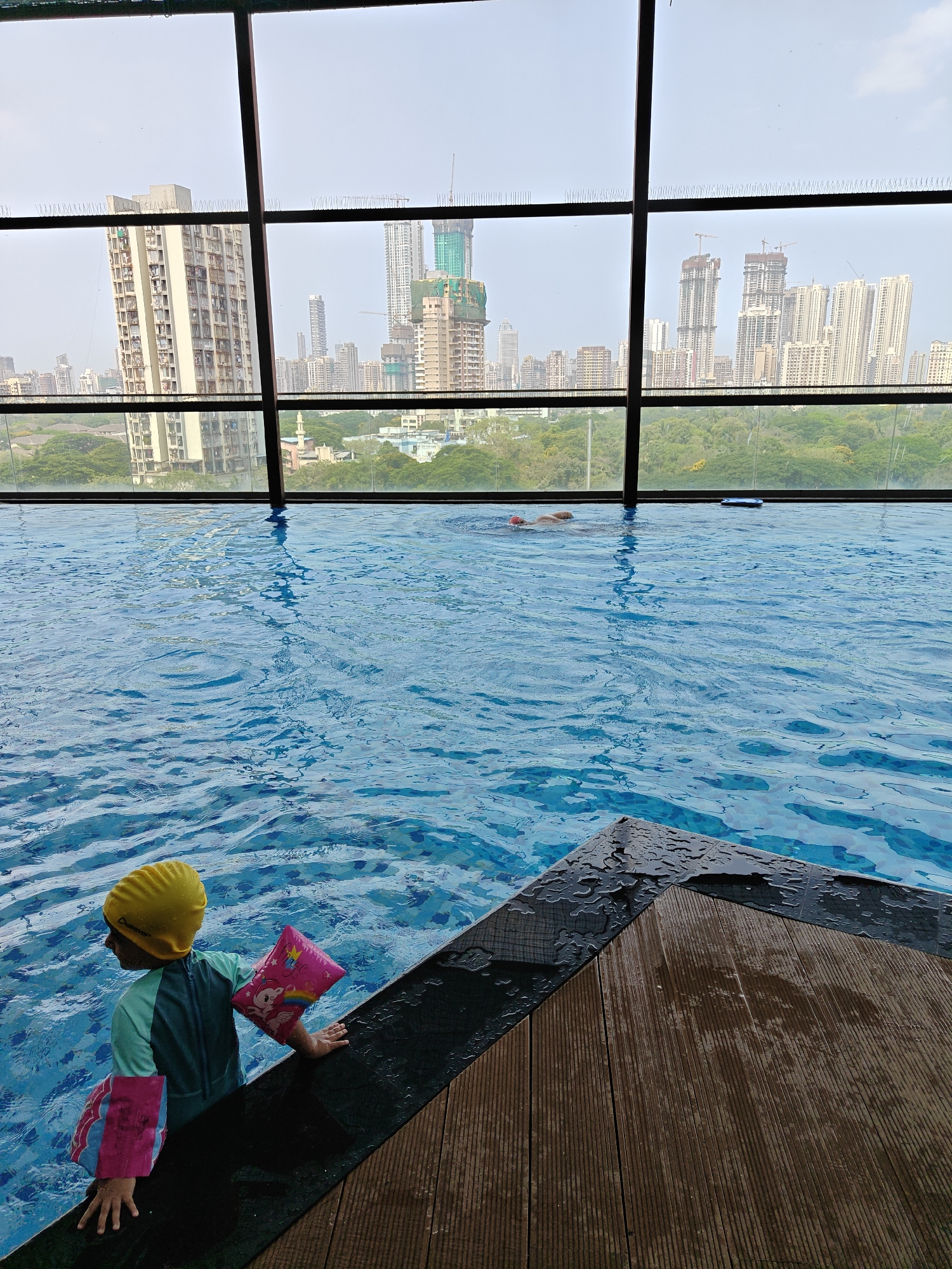 Early morning swimming session at Mumbai rooftop pool facility