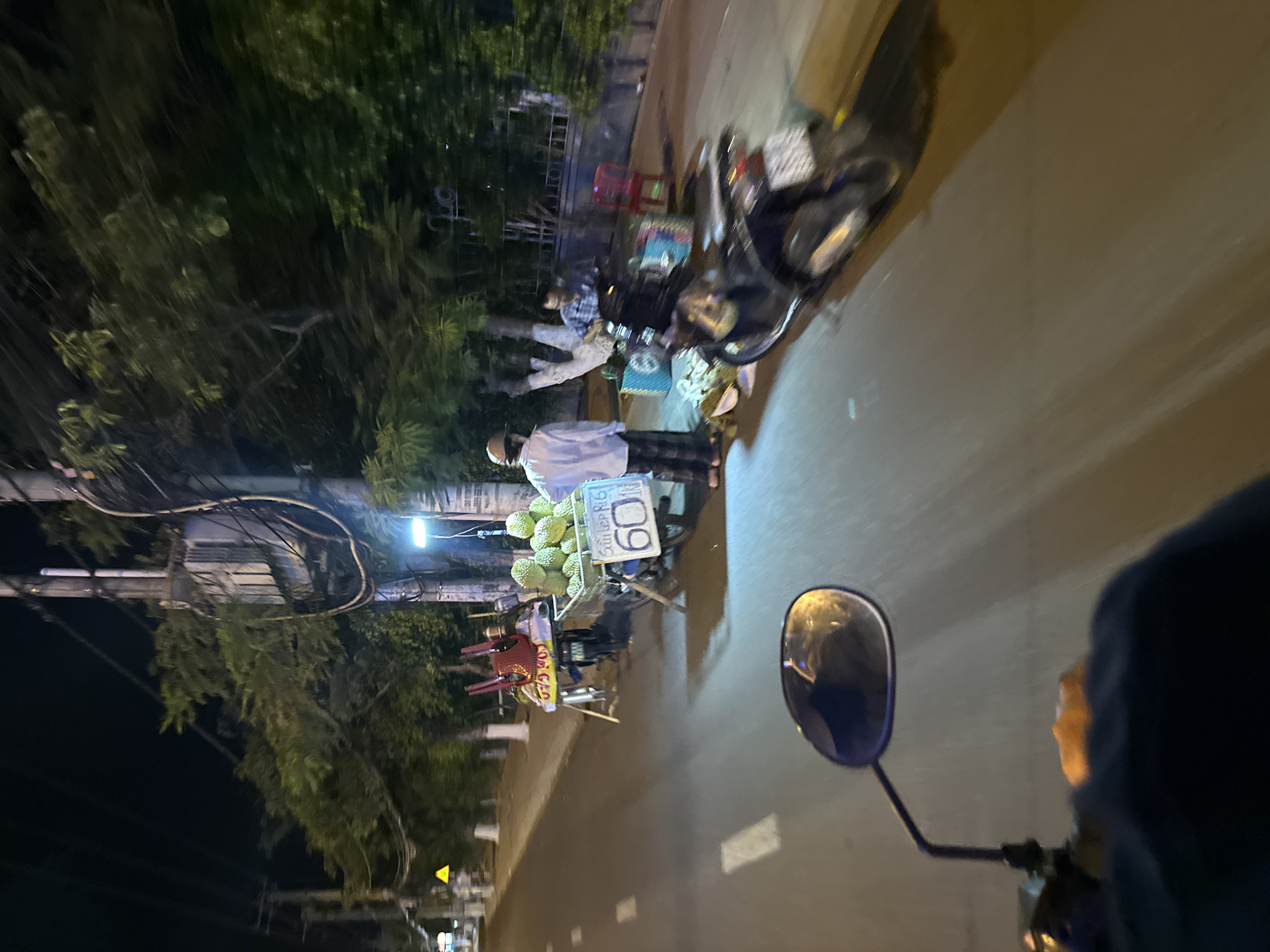 Nighttime street scenes captured by motorbike rider in Vietnam