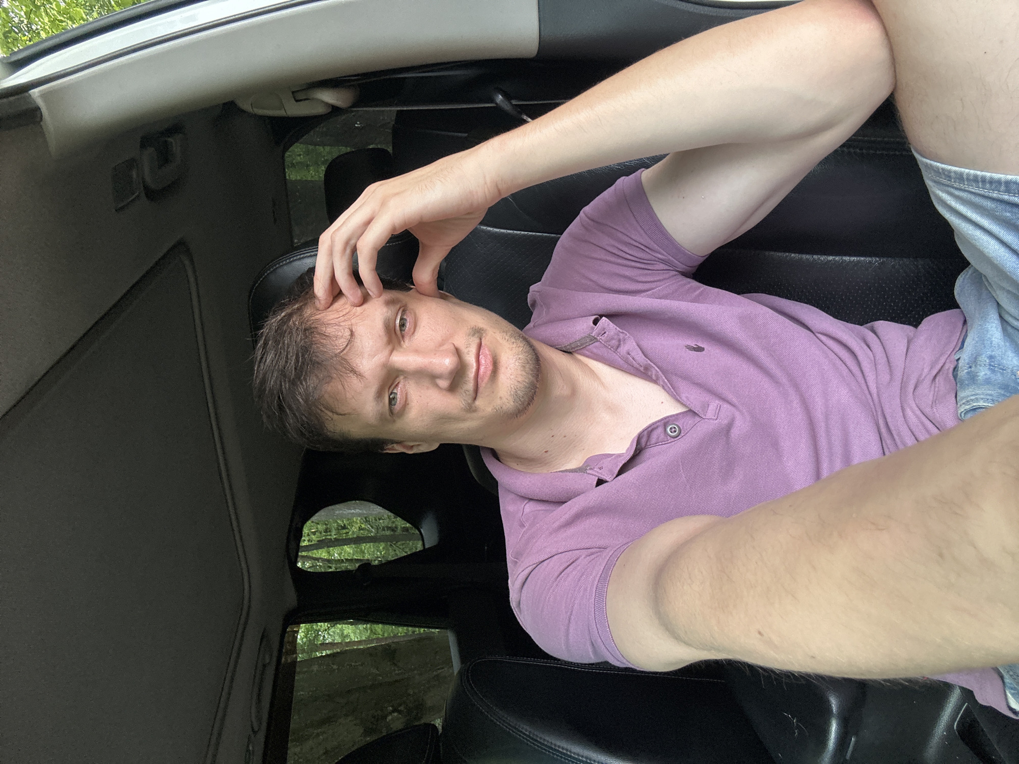 Driver selfie session parked near forest in Shatava, Ukraine