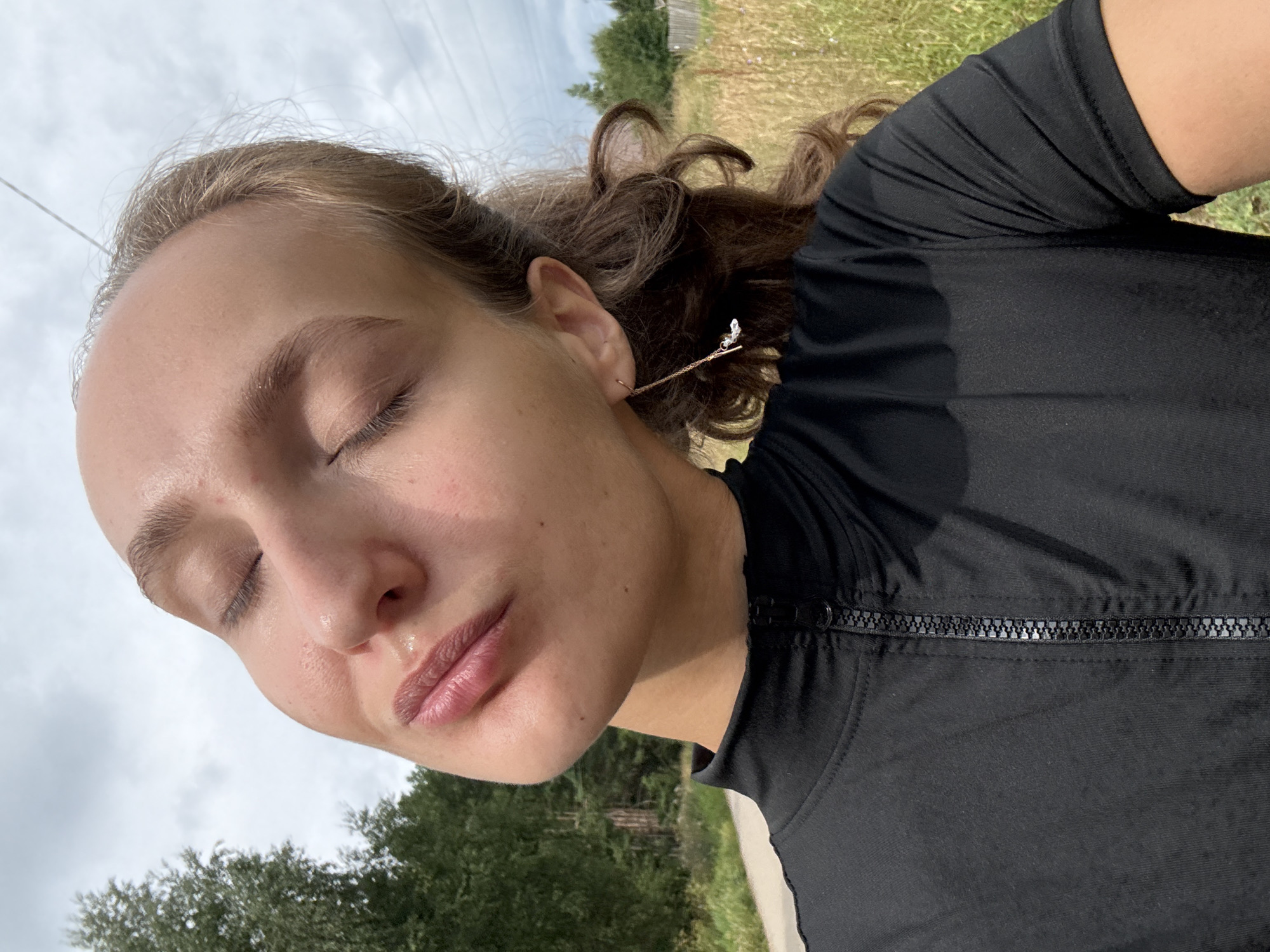 Casual selfie session among pine trees in rural Russia