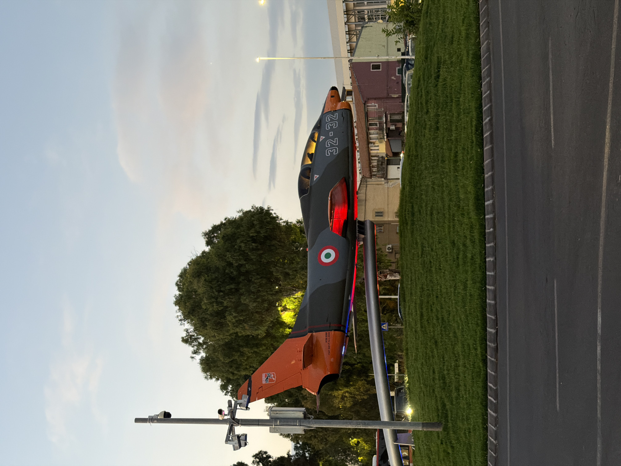Military aircraft display and fallen road sign observed in Catania