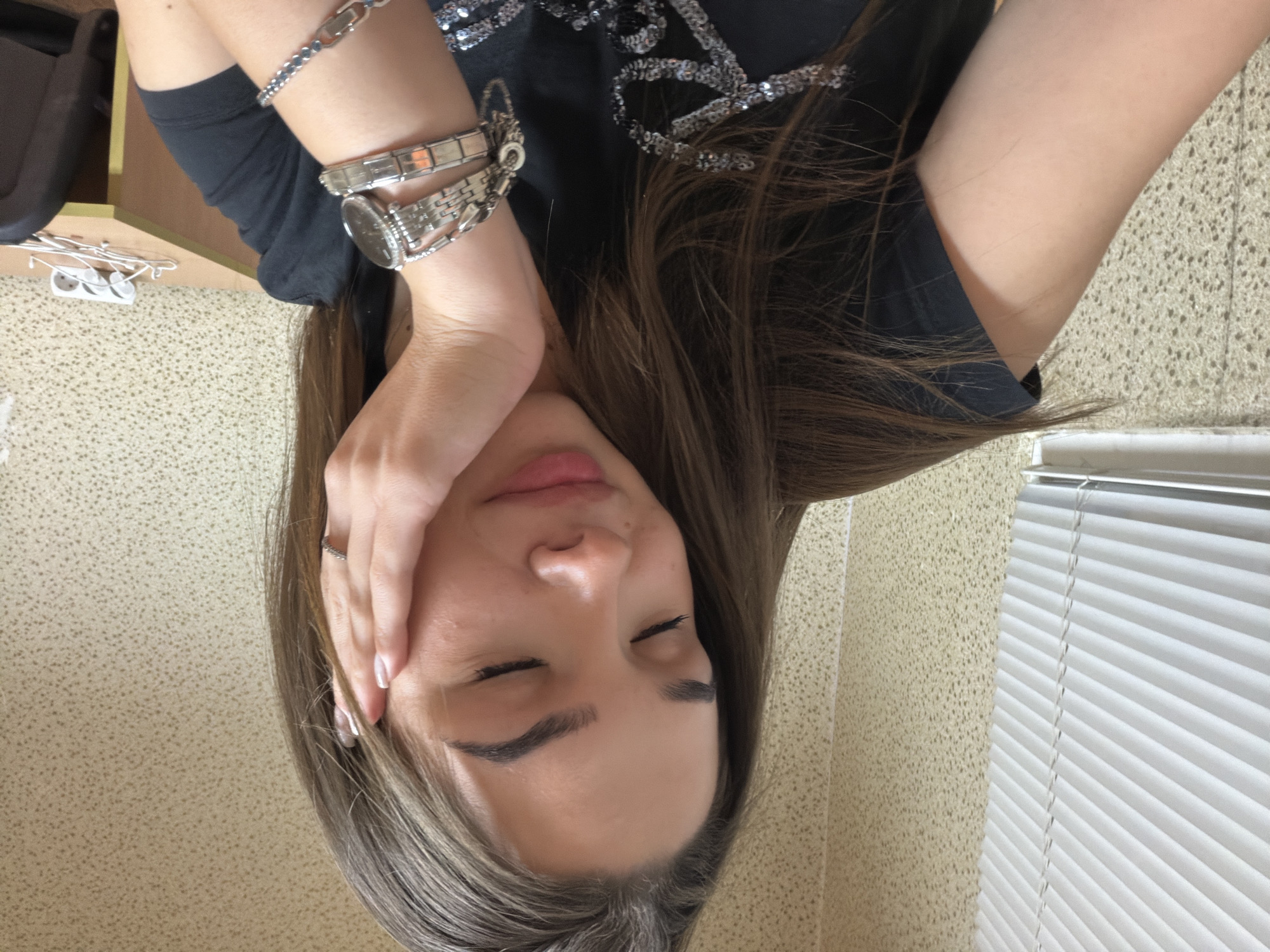 Woman takes selfies indoors in Sofia, Bulgaria
