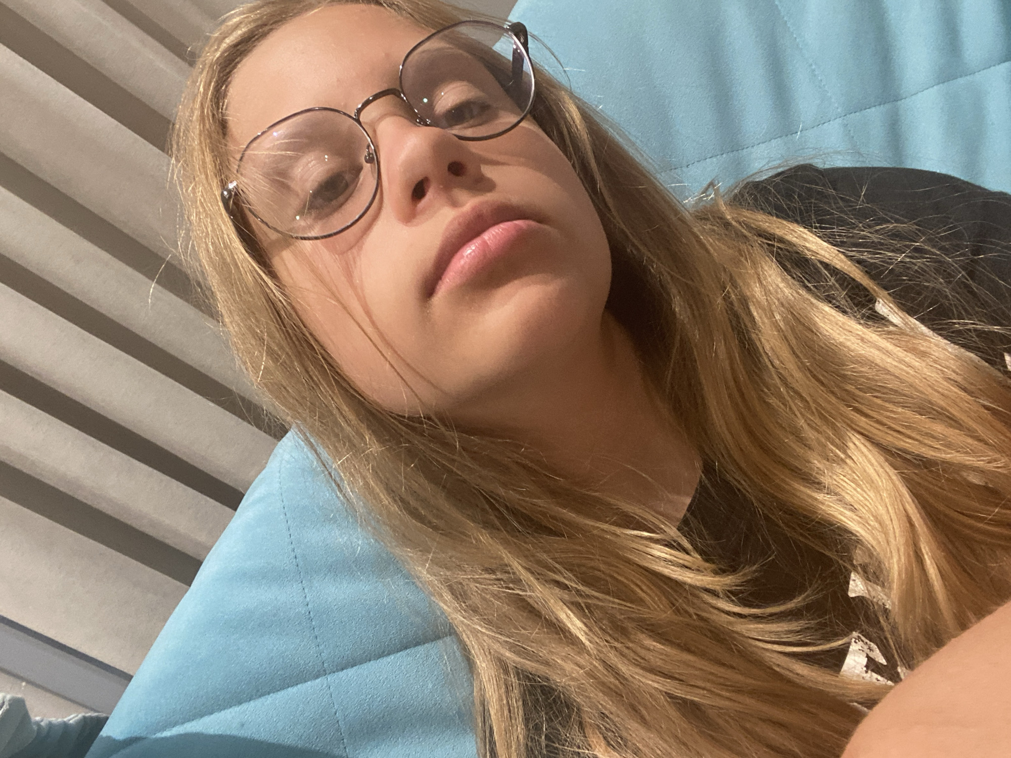 Close-up selfie series with round glasses, Sochi
