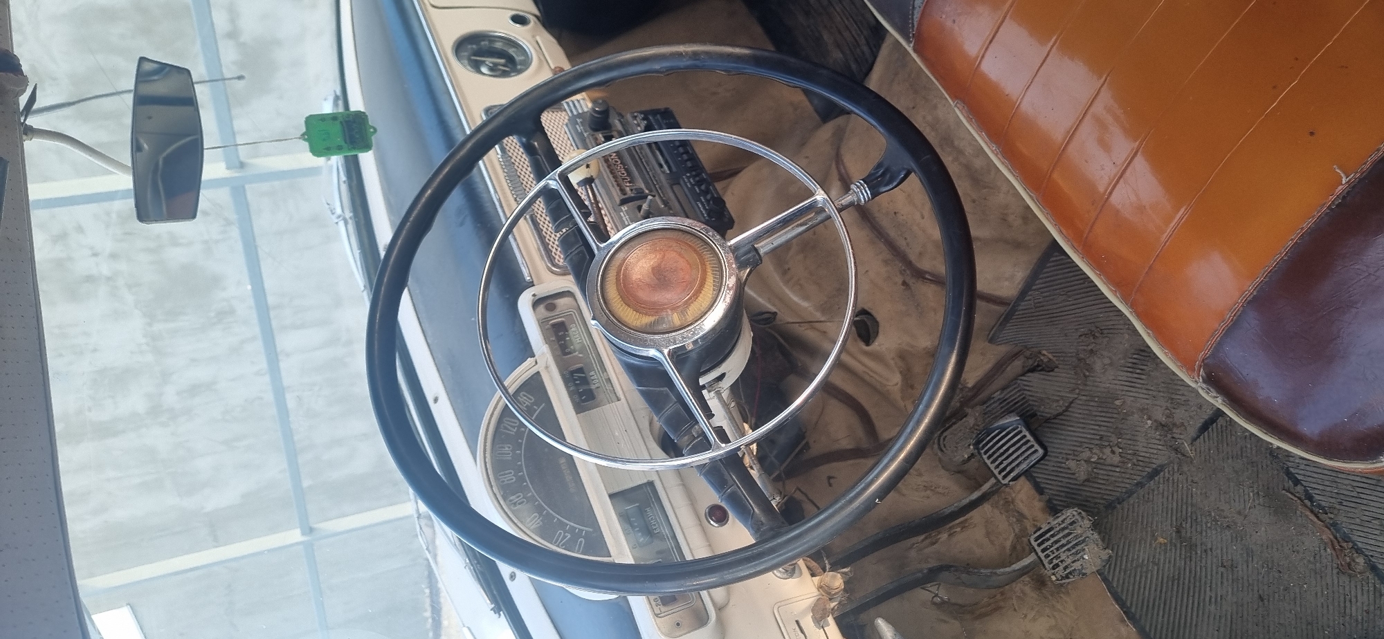 Vintage car interior and rusted parts documented in Ukraine