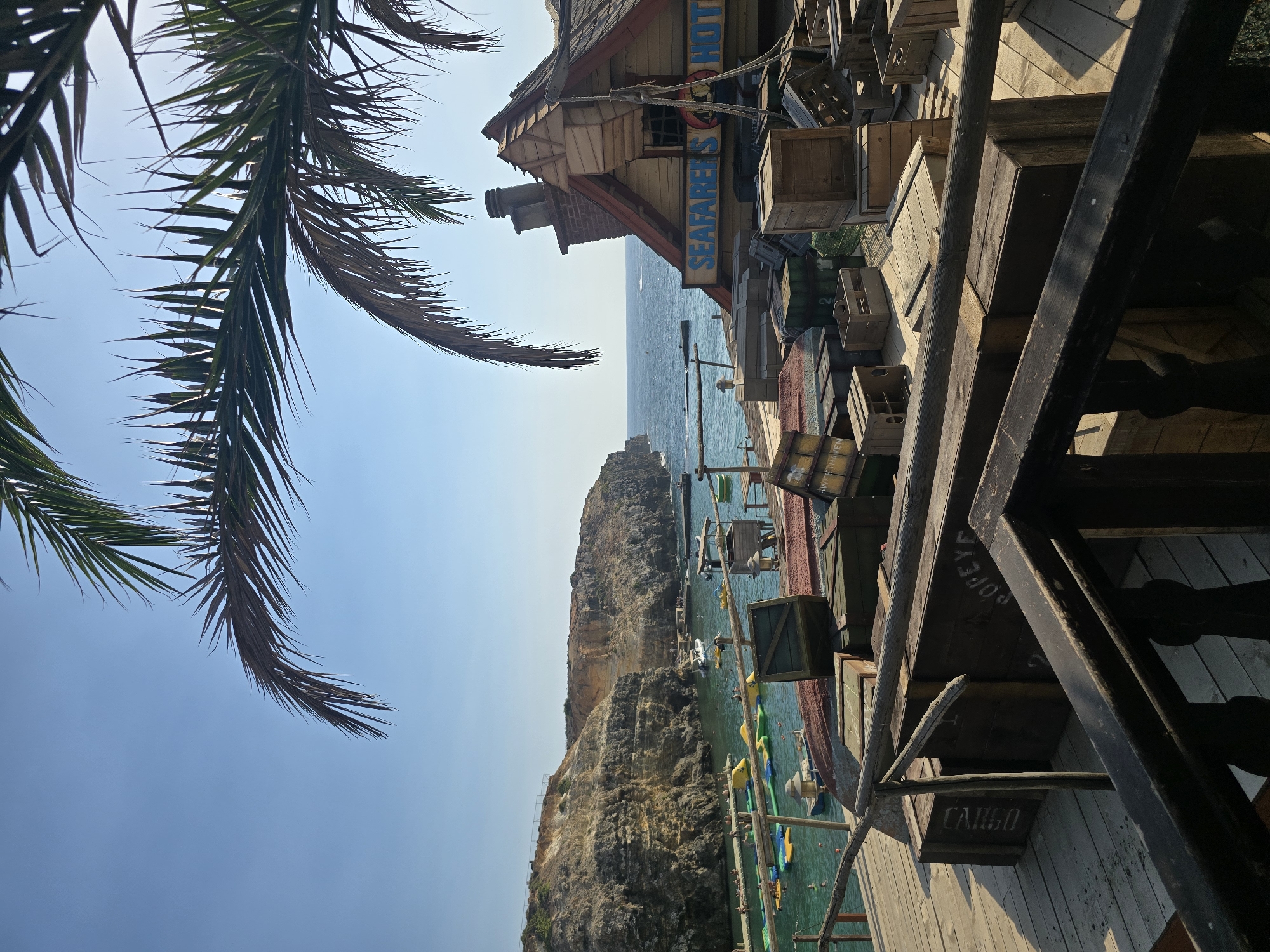 Popeye Village and Mellieħa's beaches on a busy summer afternoon