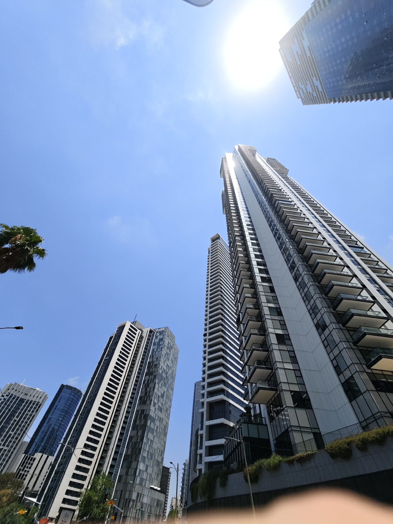 Givatayim and Tel Aviv skylines on a clear summer morning