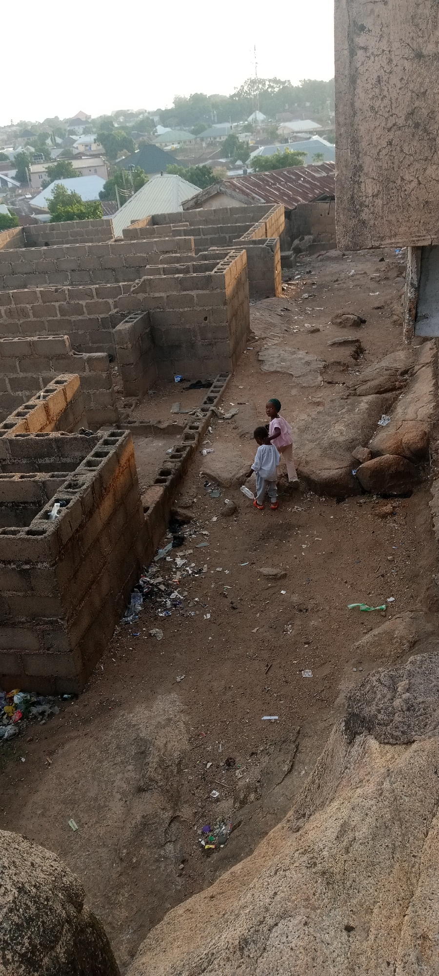 Daily life documented across Jos, Nigeria streets and construction sites