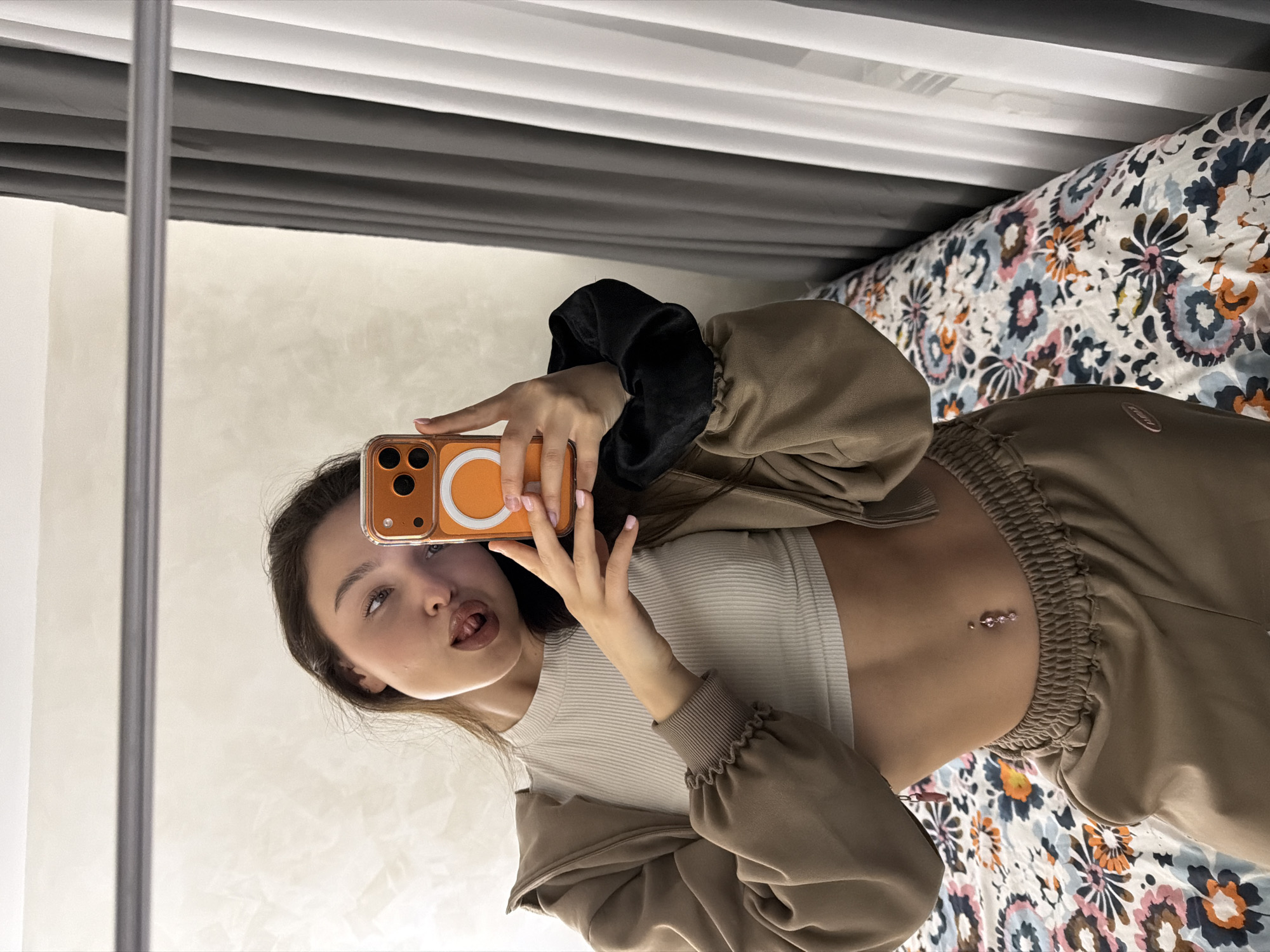 Woman Takes Multiple Mirror Selfies in Pernik, Bulgaria
