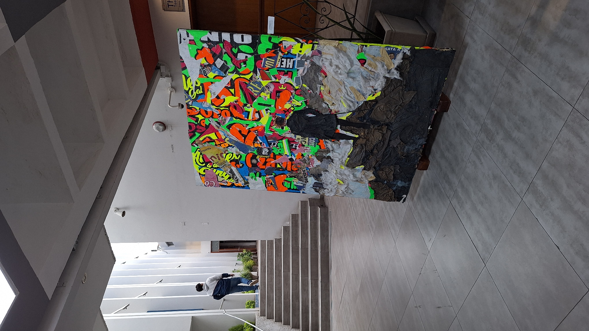 Mixed-media textile artwork displayed outdoors in Arequipa, Peru