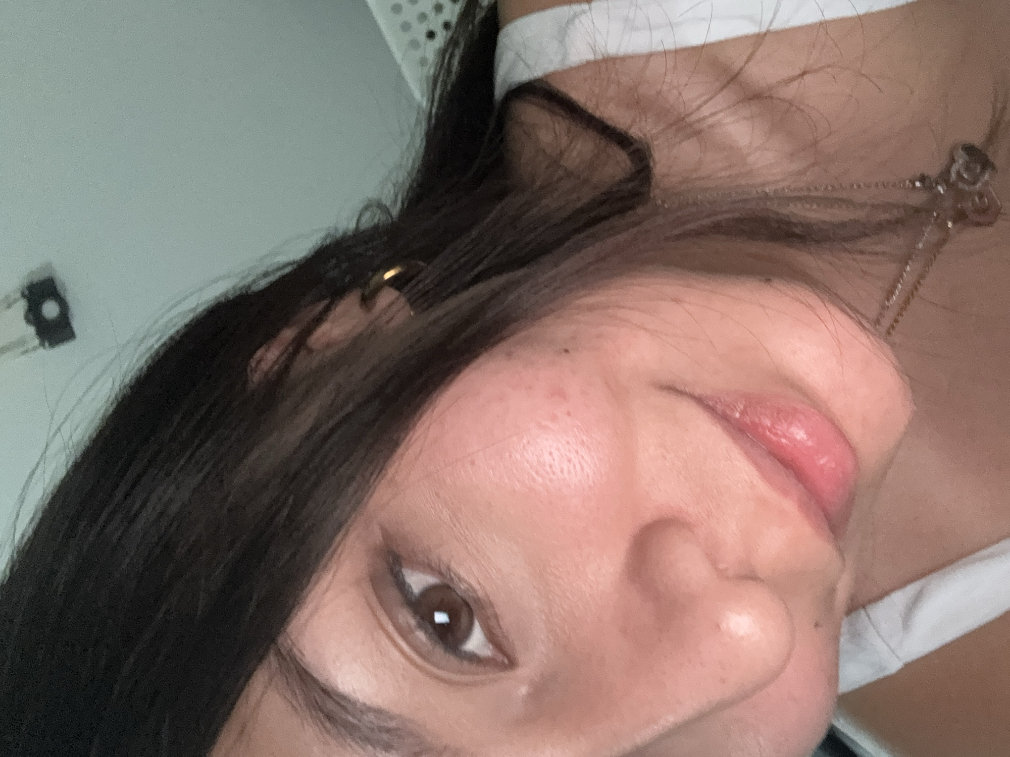 Woman takes selfie in San Francisco Ocotlán, Mexico