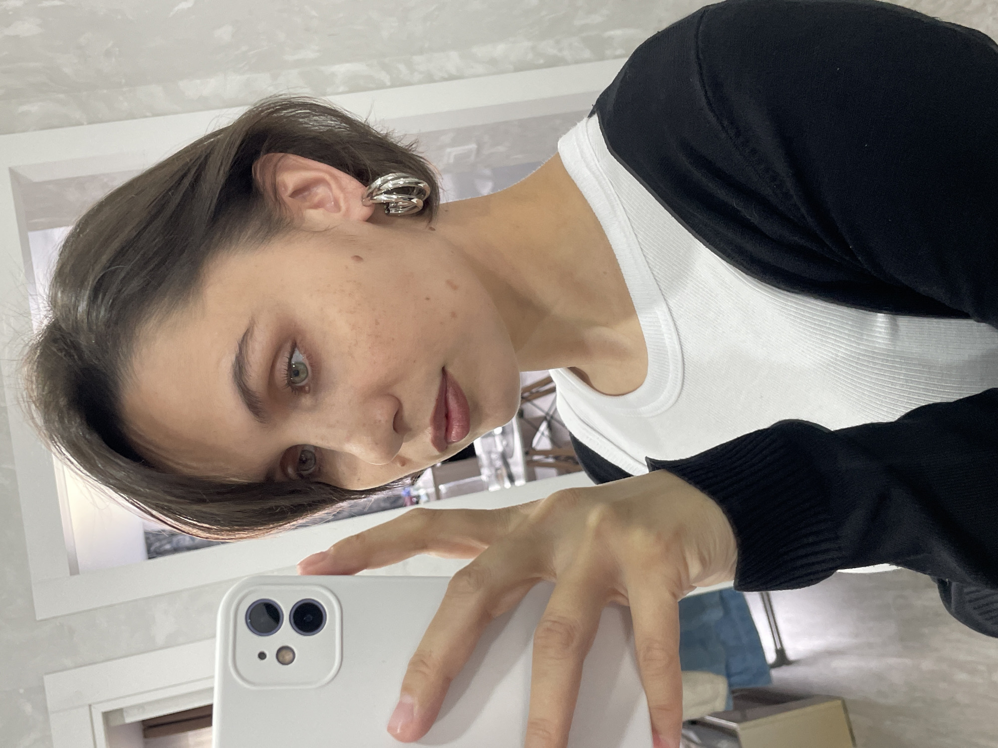 Woman takes selfies in Izhevsk interior space