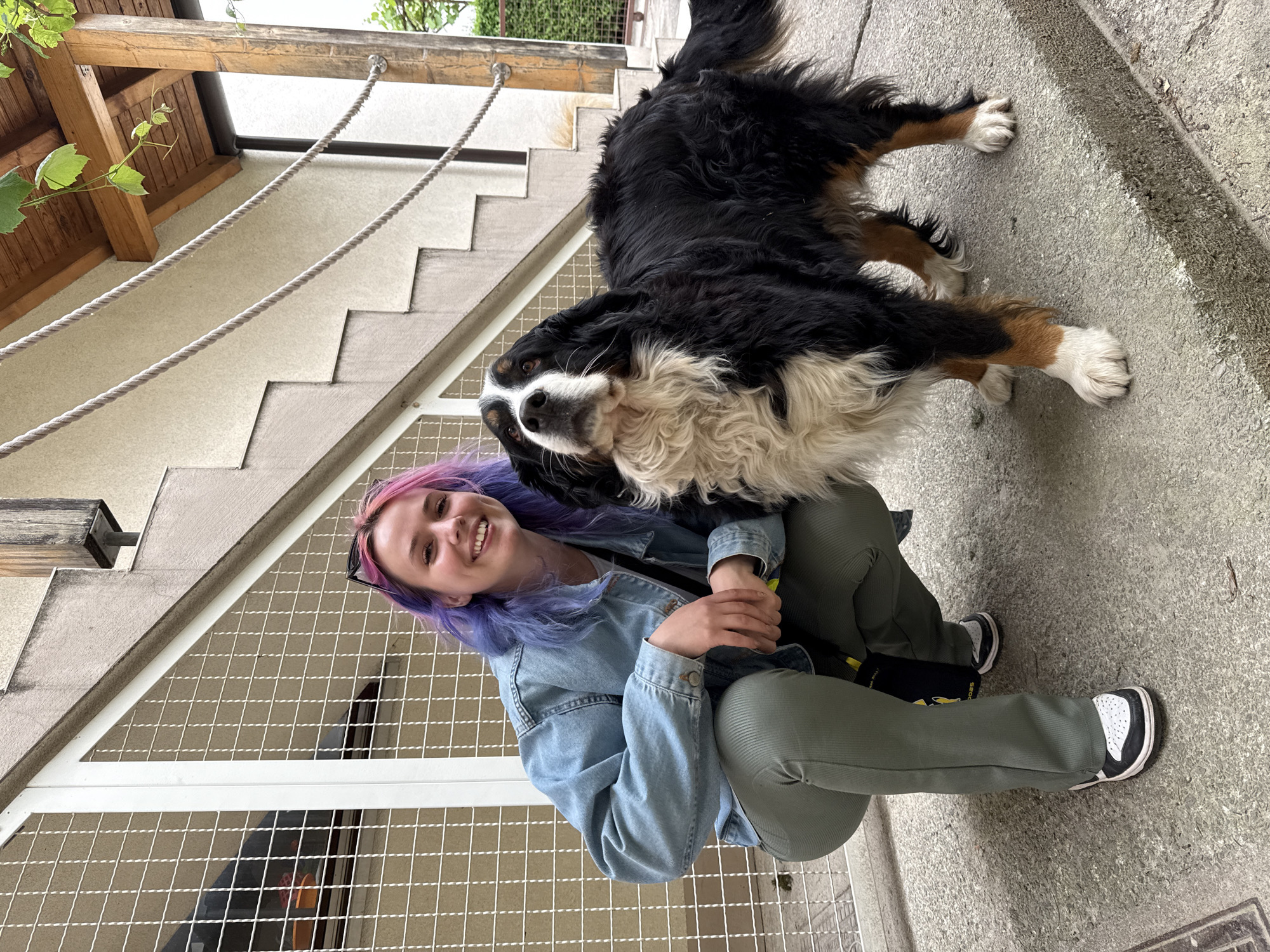 Colorful-haired person explores Zagreb with dog, captures spring blooms
