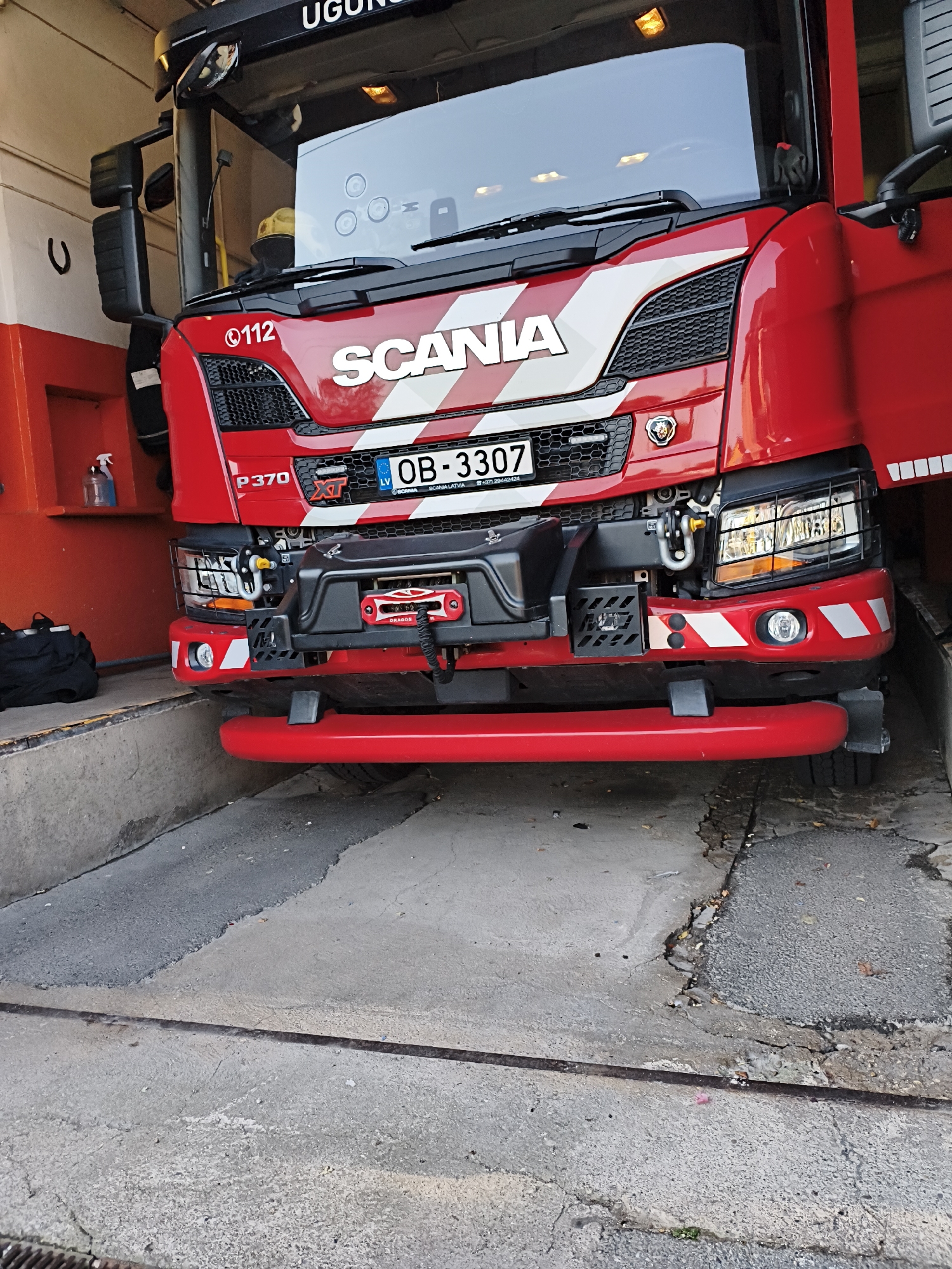Inside and outside Tukums fire station, Latvia's rescue service trucks on show